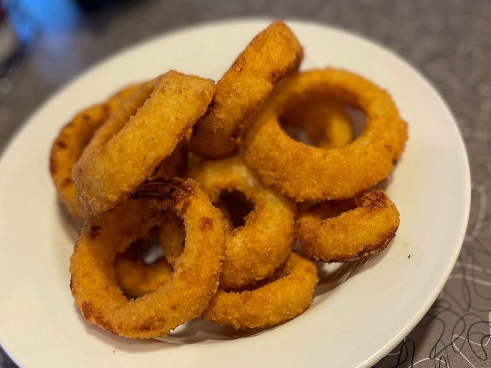 Order Side Onion Rings - OO food online from Biscuits Cafe store, Chandler on bringmethat.com