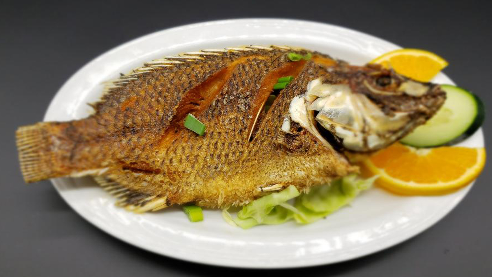 Order Fried Tilapia food online from Bamboo Bistro store, Los Angeles on bringmethat.com