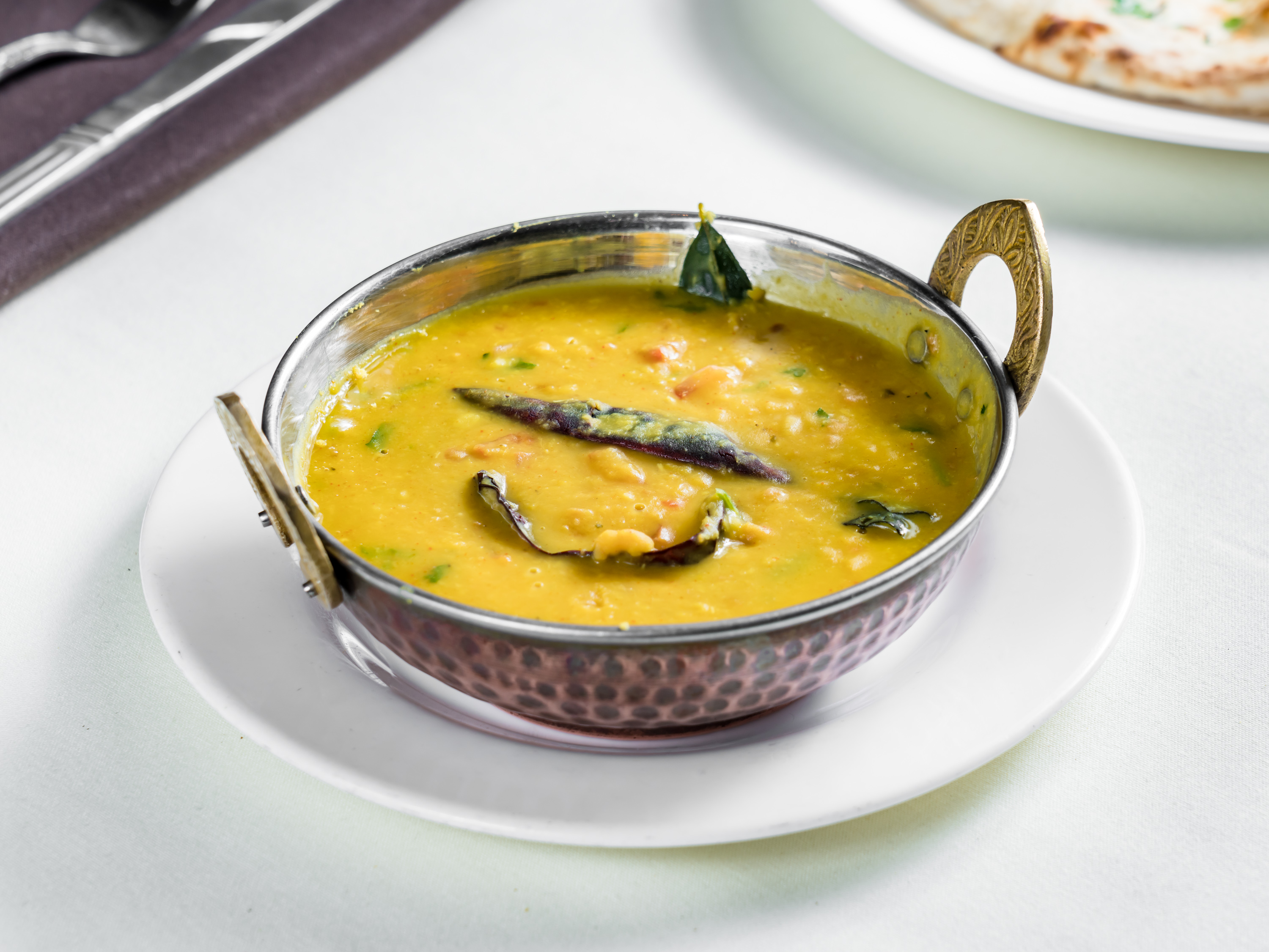 Order Veghareli Daal food online from Tandoor store, Queens on bringmethat.com