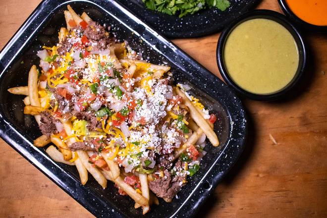 Order Famous Carne Asada Fries food online from Adrians Tacos California store, Houston on bringmethat.com