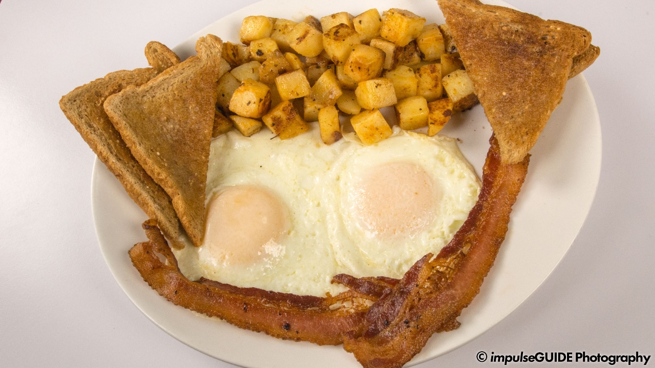 Order 2 XL Eggs w/ Homefries food online from Louie's Texas Red Hots store, Buffalo on bringmethat.com