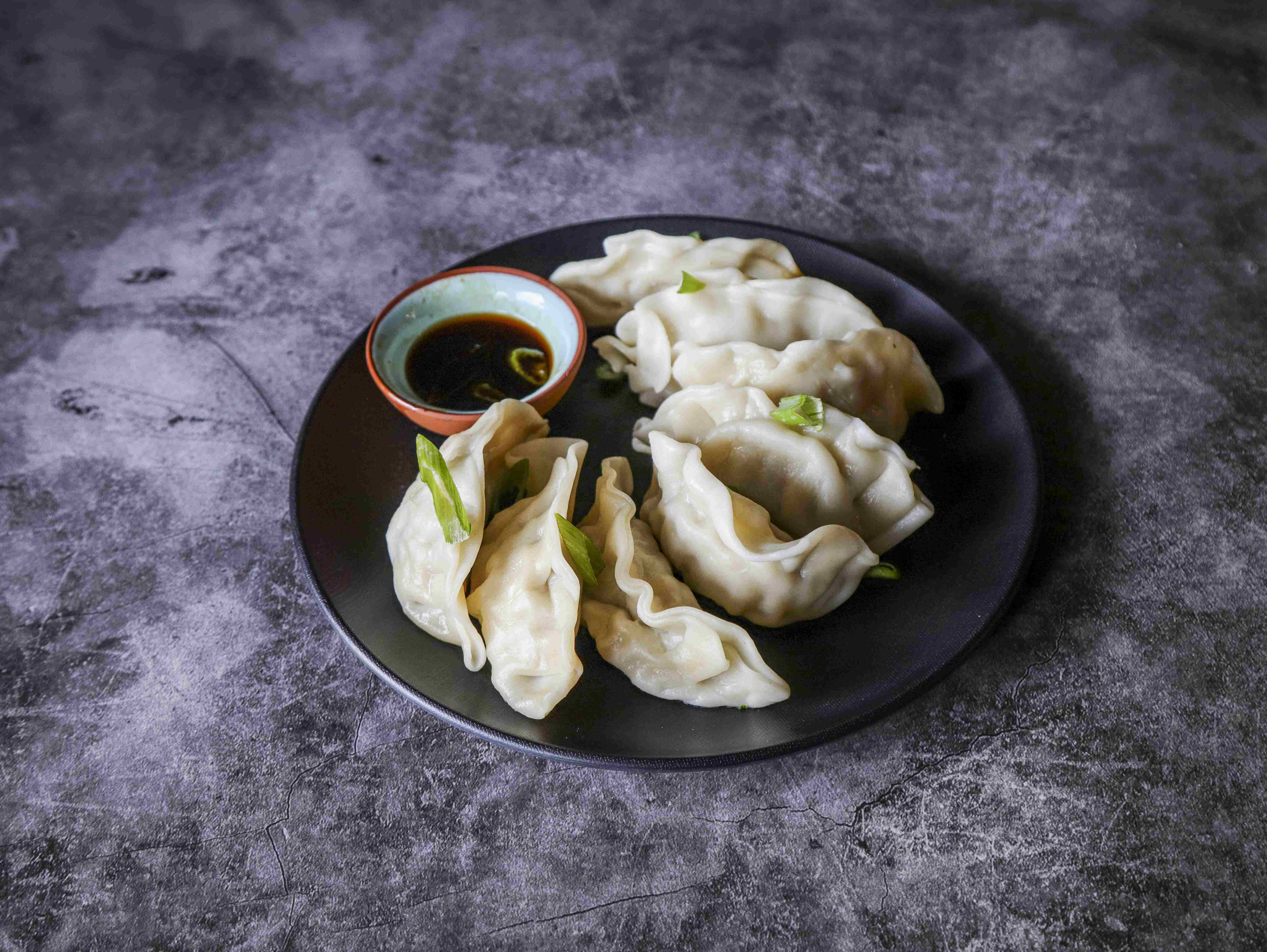 Order 5. Steamed Pot-Stickers food online from China House store, Coralville on bringmethat.com
