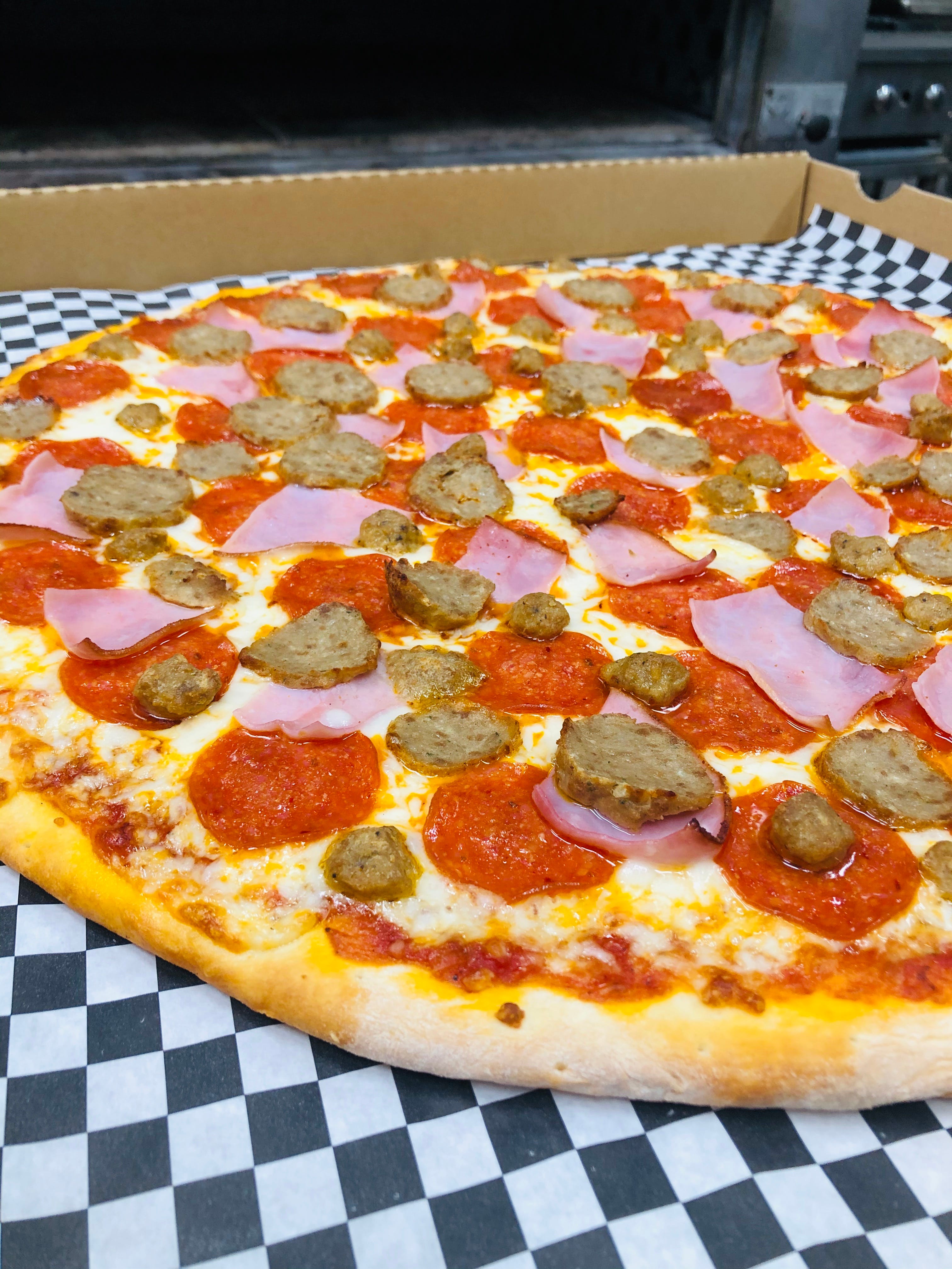 Order Meat Lover's Pizza - Regular 14" (8 Slices) food online from Oros Pizza & Bakery store, Van Nuys on bringmethat.com