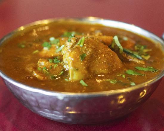 Order Chicken Vindaloo food online from Taj Indian Restaurant store, Nashville on bringmethat.com