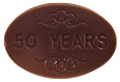 Order 50 Years Chocolate Oval food online from Painted Turtle Chocolatier store, Osseo on bringmethat.com