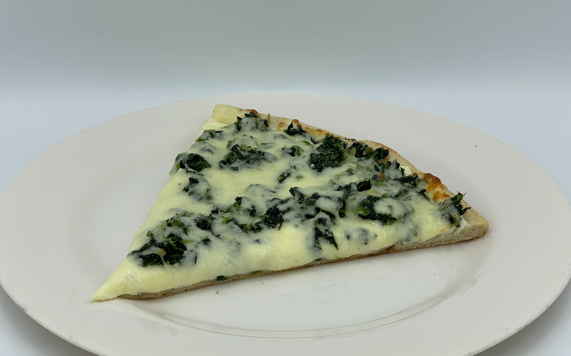 Order White Spinach Pizza - Personal food online from Mario Pizza store, Westbury on bringmethat.com