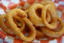 Order Onion Rings food online from La Burgers & Daiquiris store, Houston on bringmethat.com