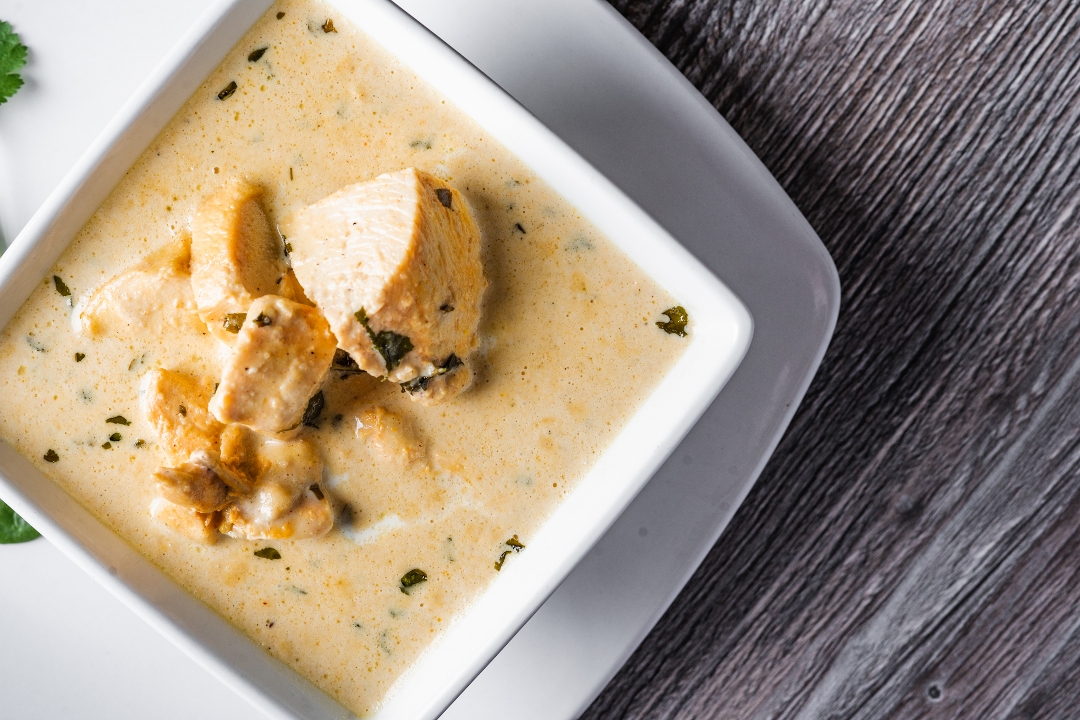 Order Chicken Malai Korma (GF) food online from Lime & Lemon Indian Grill store, Raleigh on bringmethat.com