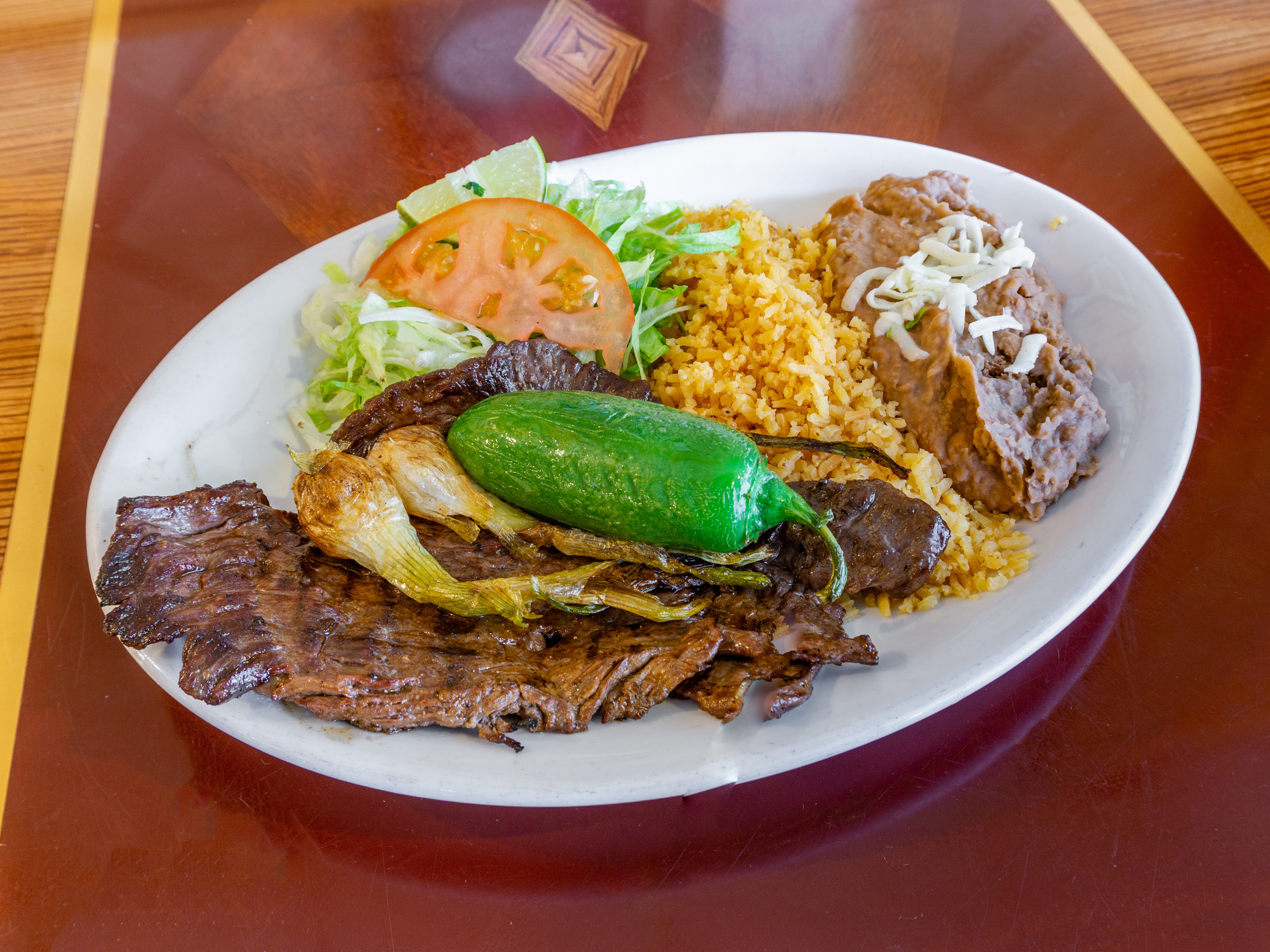 Order Carne Asada Skirt Steak Dinner food online from Taqueria El Ranchito store, Chicago on bringmethat.com