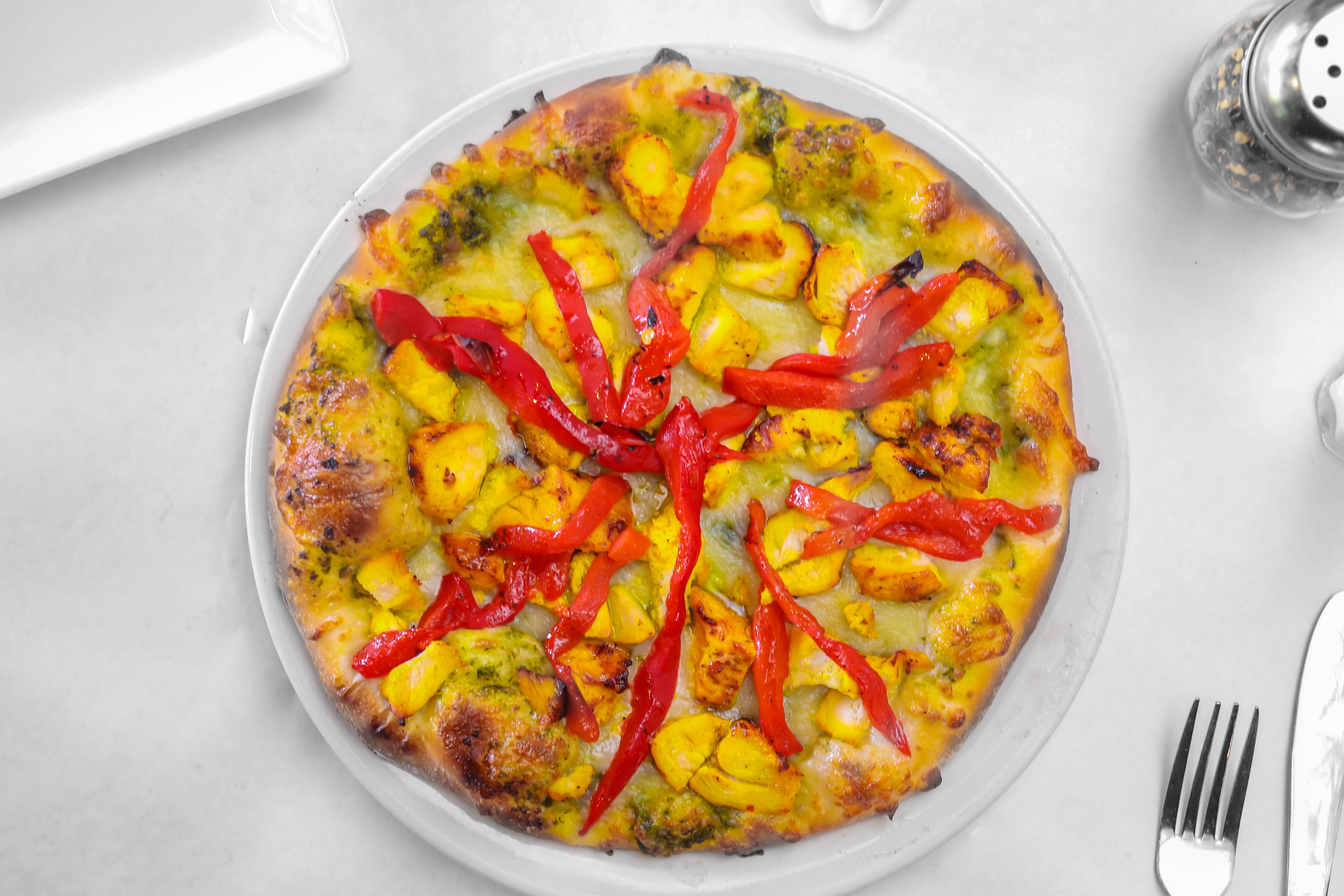 Order Chicken Pesto Pizza - 12'' (4-6 Slices) food online from Santorini Restaurant store, Danville on bringmethat.com