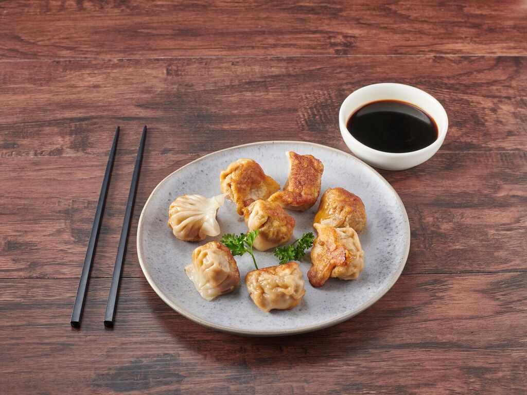 Order 205. Pan-Fried Pork Dumplings food online from Chef Yu store, New York on bringmethat.com
