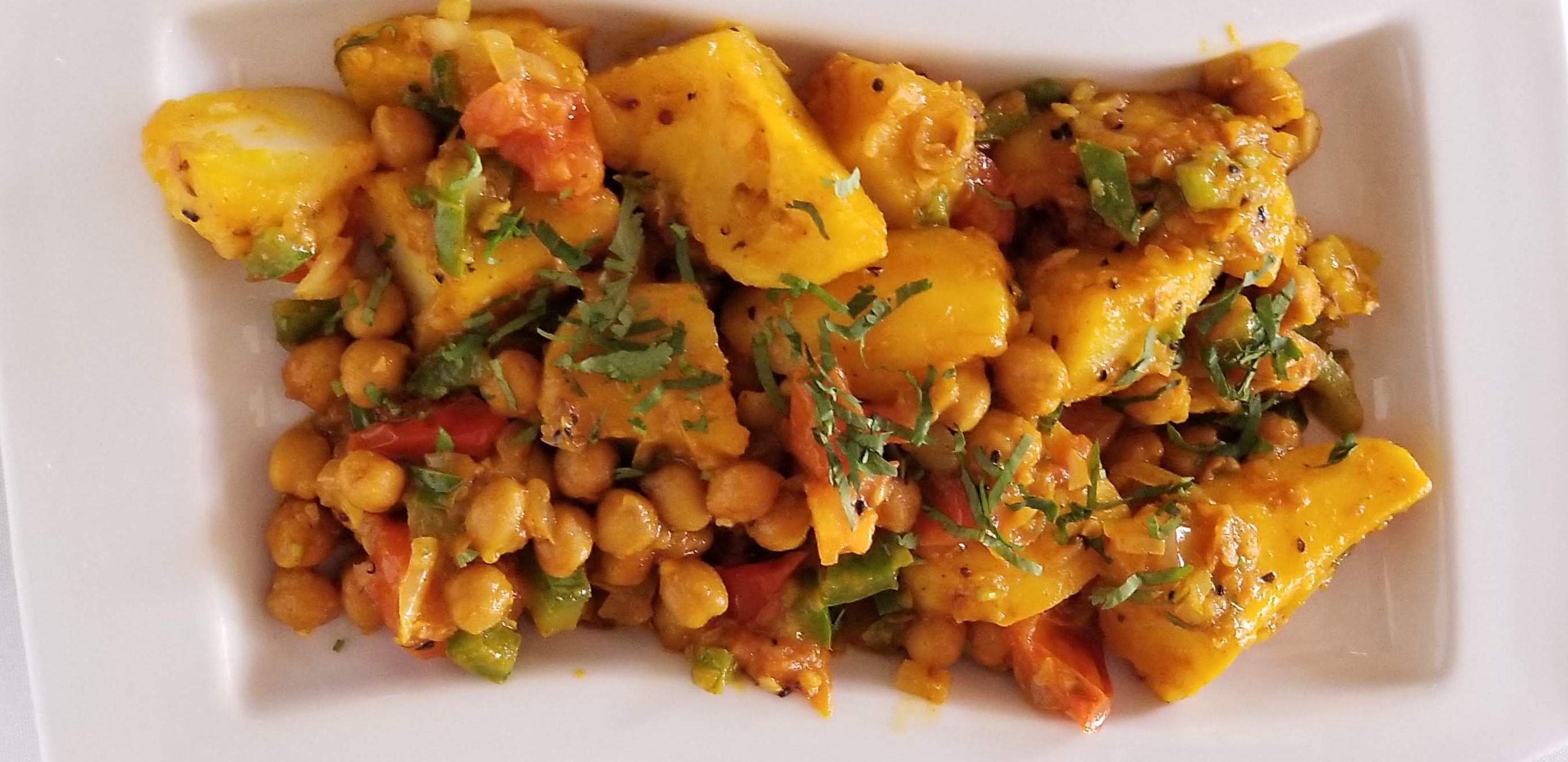 Order Aloo Chana Dinner food online from The indian kitchen store, West Hollywood on bringmethat.com