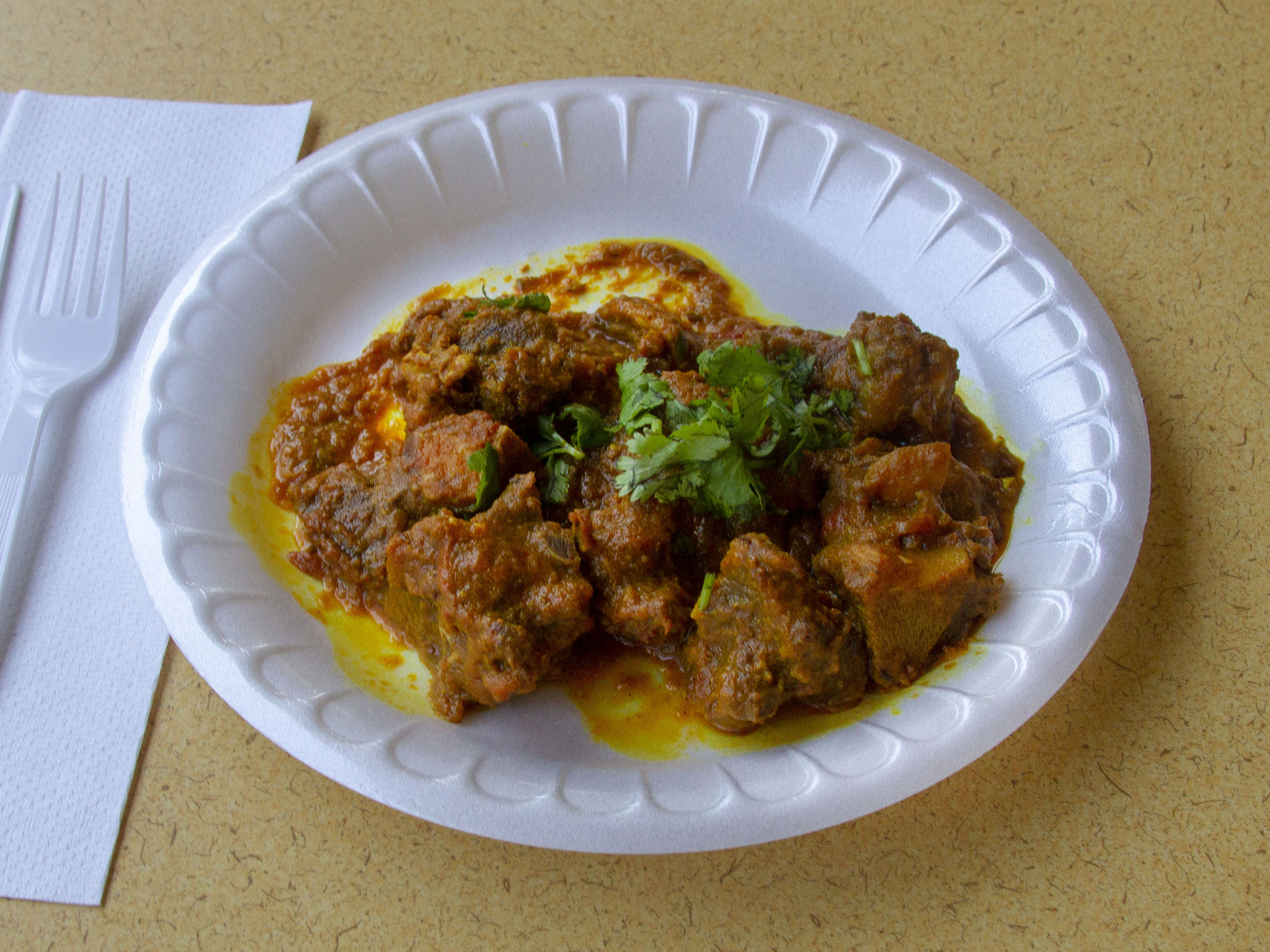 Order Goat Curry food online from Samosa Hut And Spices store, Fresno on bringmethat.com