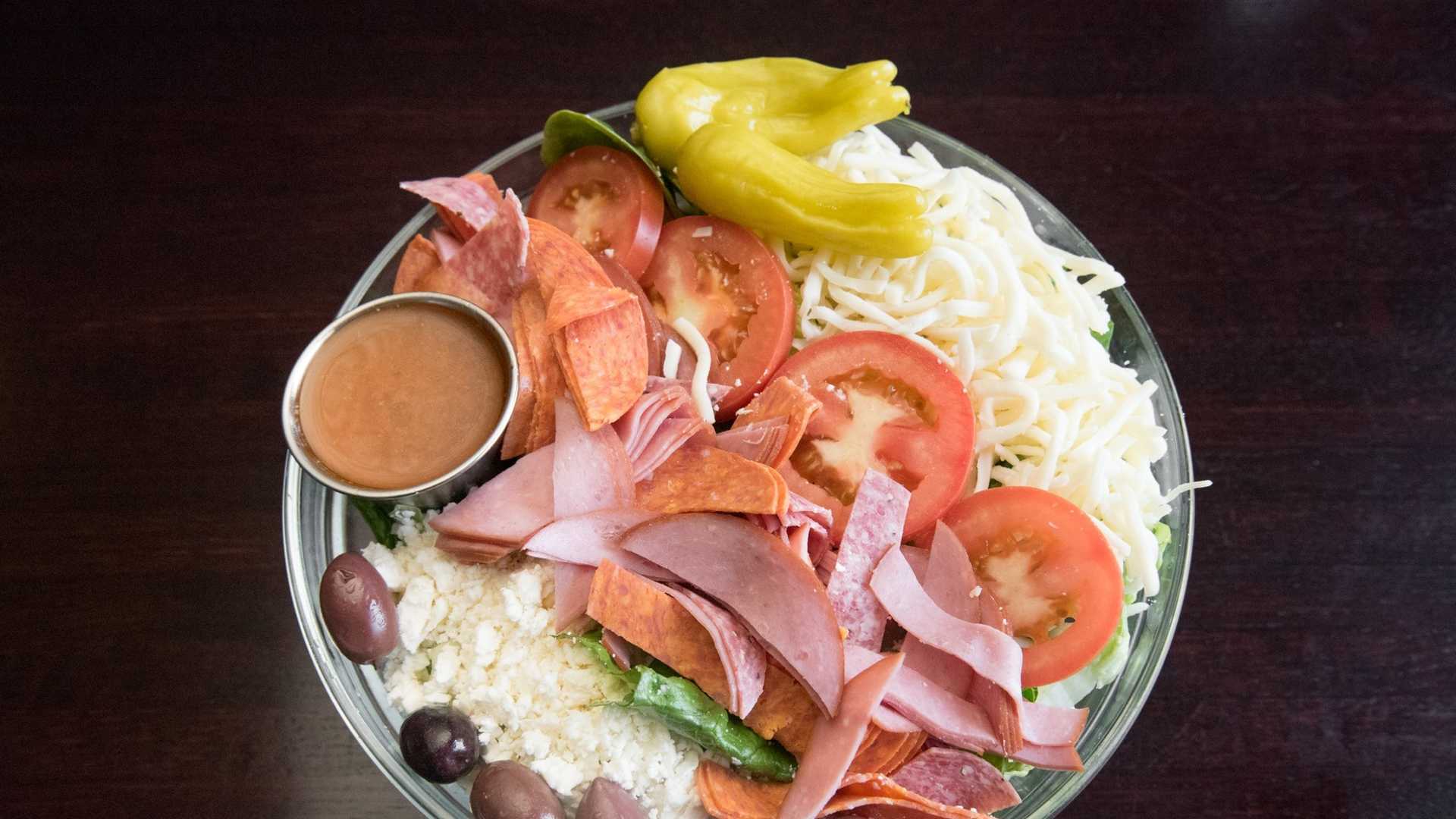 Order Antipasto Salad food online from Soprano's Pizza & Pasta store, Seattle on bringmethat.com