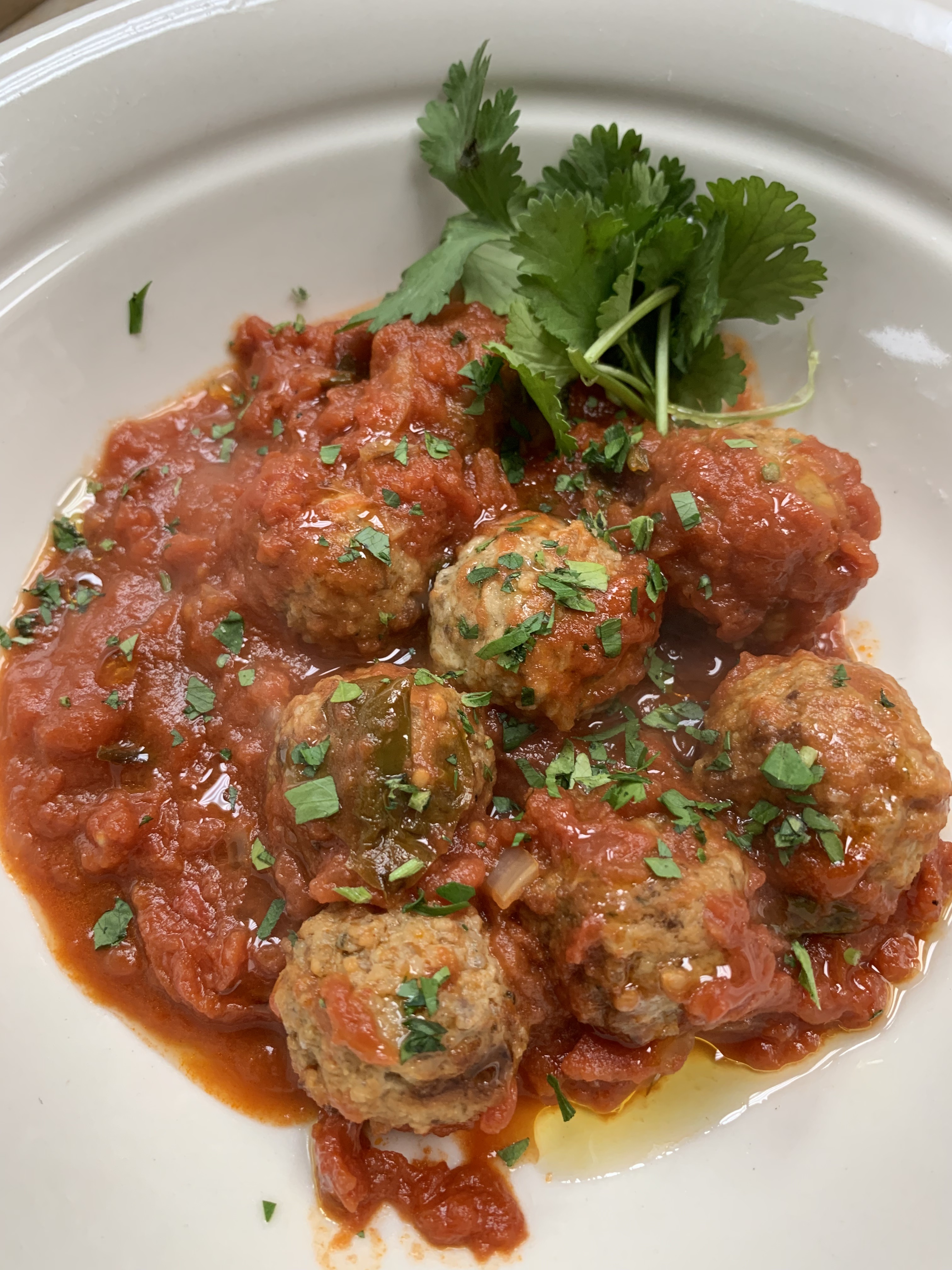 Order  Braised Beef meatballs tray ( Serves 4/6 guests) food online from IL Baretto To Go store, New York on bringmethat.com