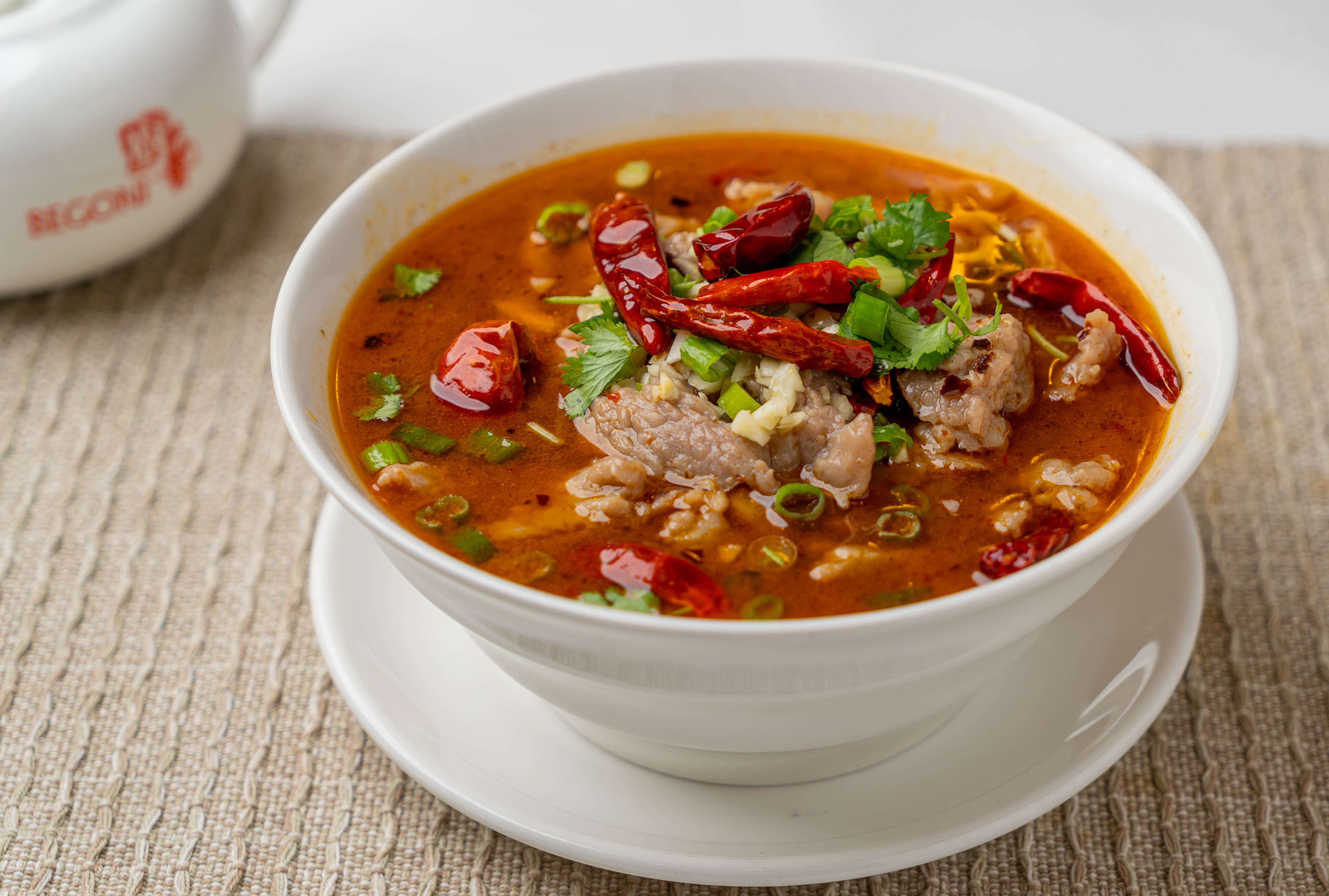 Order RN4. Szechuan Beef Noodle Soup (Spicy)  food online from Begoni Bistro store, San Francisco on bringmethat.com