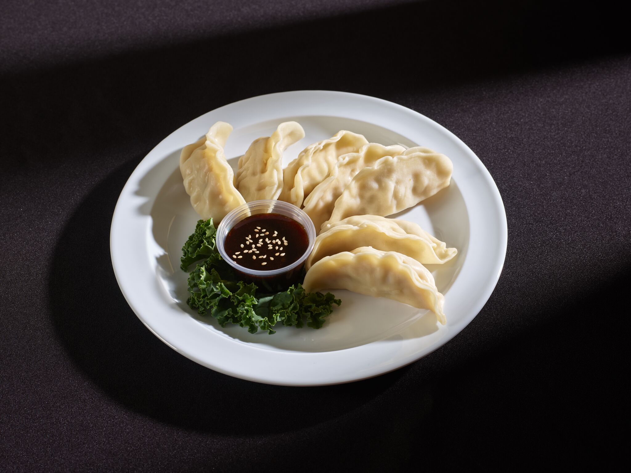 Order A5. 8 Piece Steamed Pork Dumplings food online from China King Chinese Restaurant store, Morrow on bringmethat.com