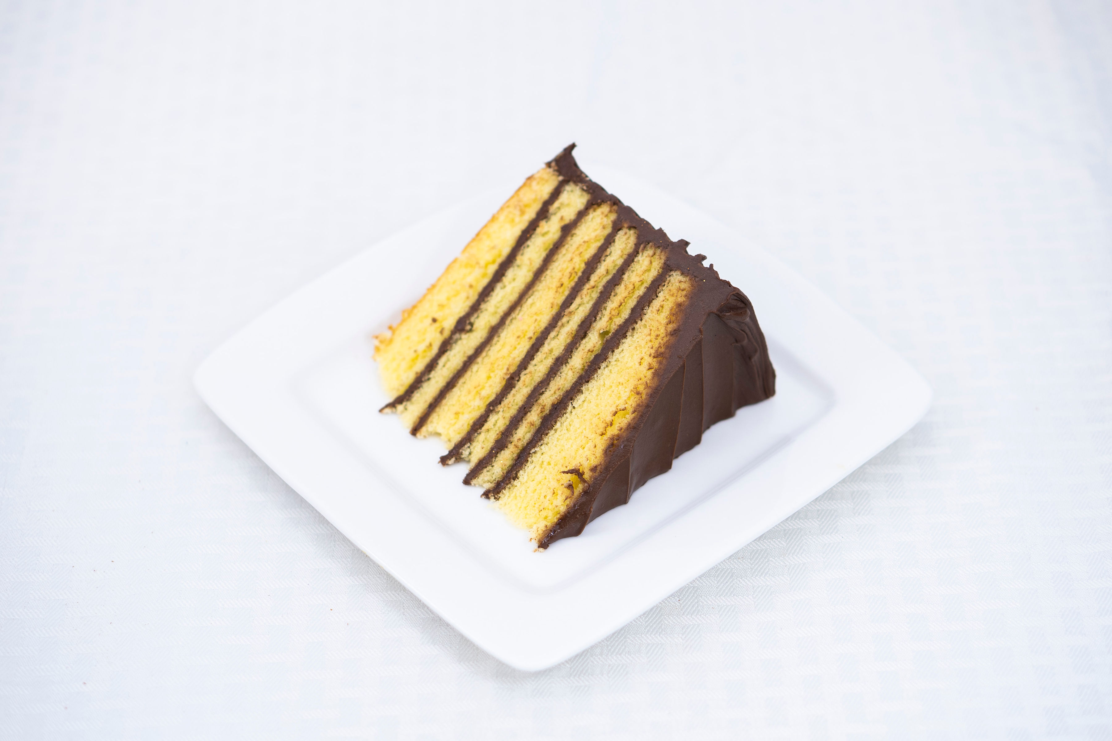 Order 6-Layer Butter Chocolate  food online from Cococakes By Coco store, Tucker on bringmethat.com