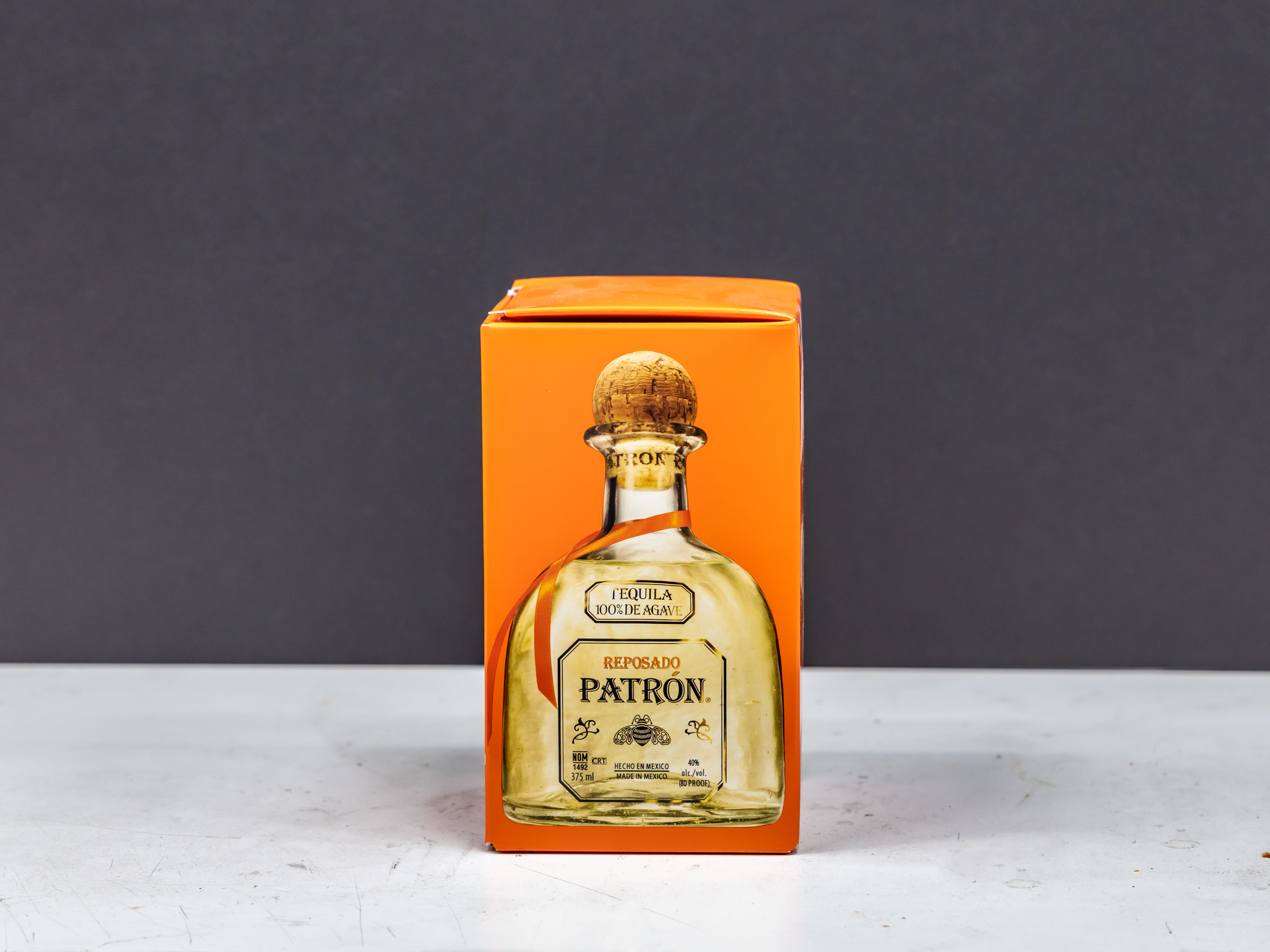 Order 750 ml. of Patron Reposado tequila  food online from Liquor Deli store, La Puente on bringmethat.com