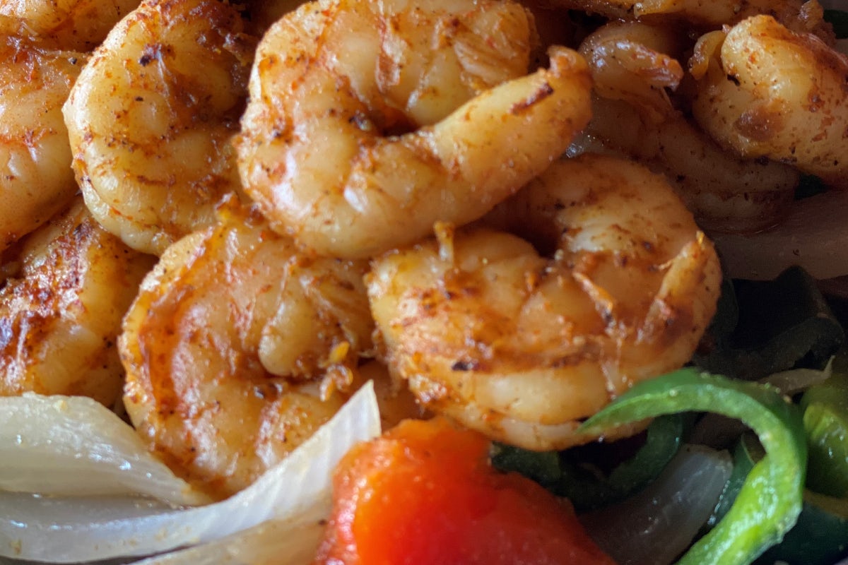Order Seasoned Shrimp Fajitas for 1 food online from Uncle Julios Fine Mexican Food store, Chicago on bringmethat.com