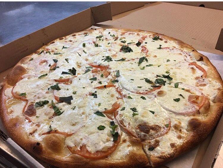 Order 33. Margherita Pizza - Small 12" (8 Slices) food online from Hometown Pizza of Bristol store, Bristol on bringmethat.com