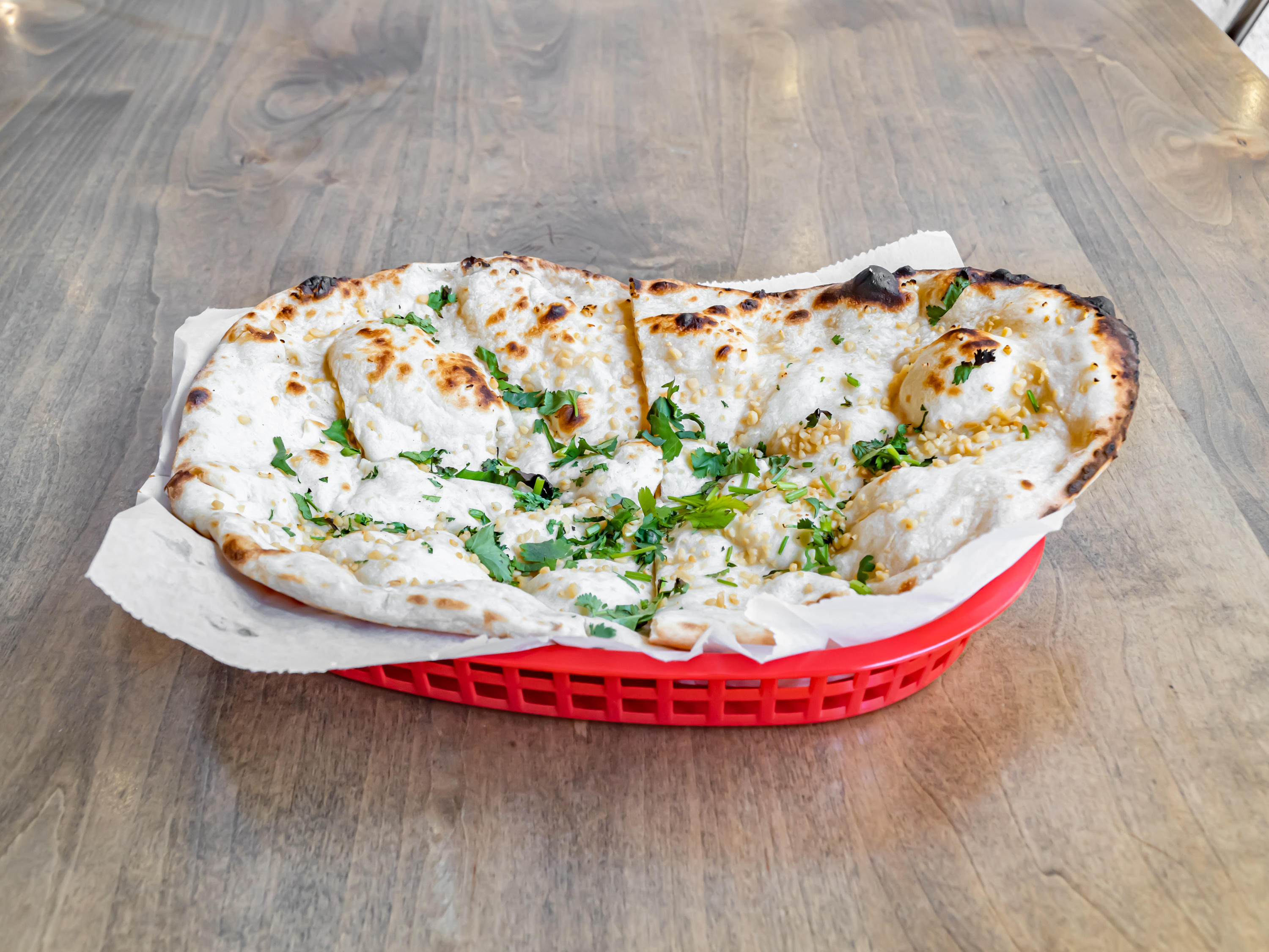 Order Garlic Naan food online from Biryani Kabob House store, Los Angeles on bringmethat.com