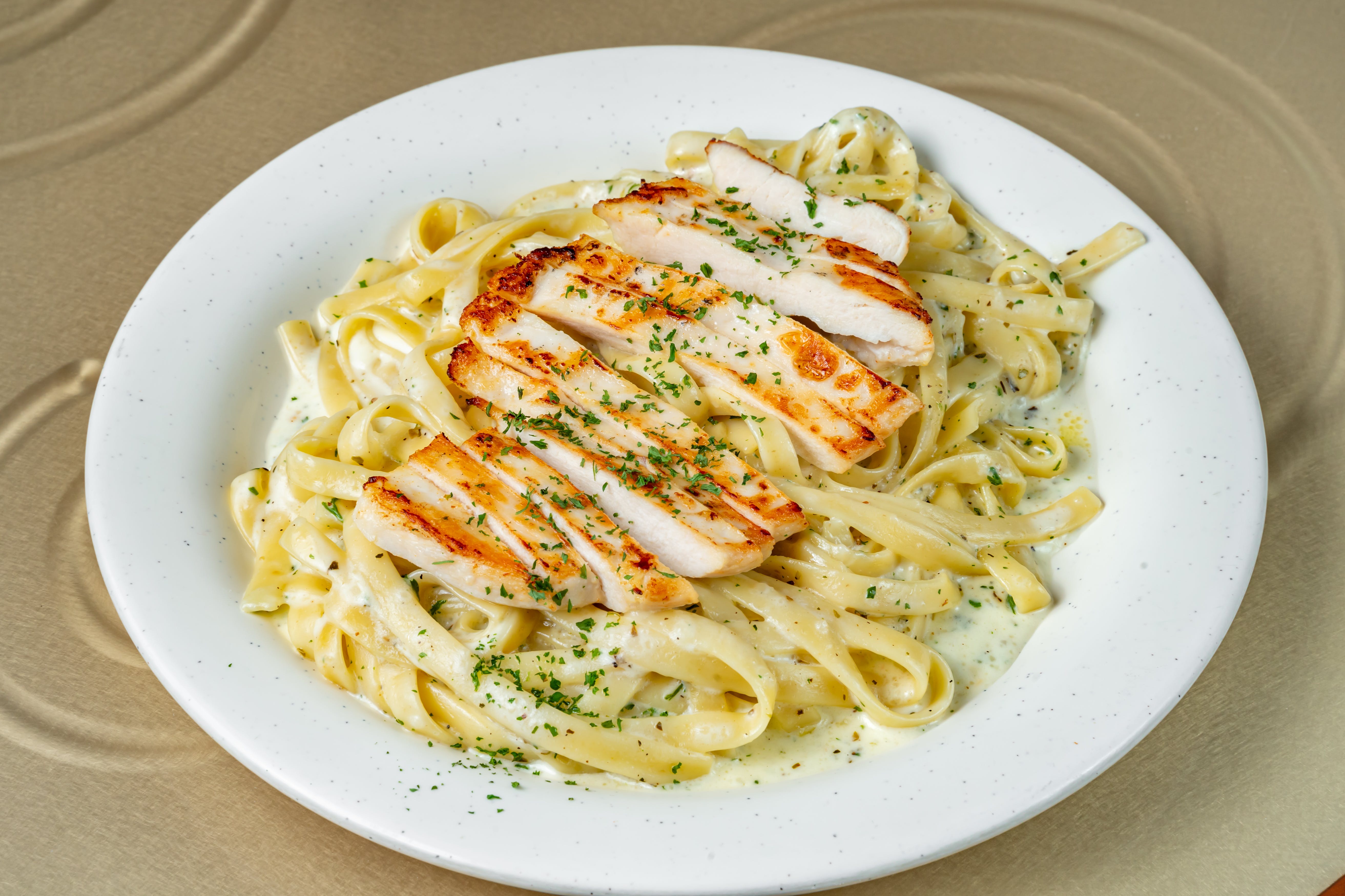 Order Chicken Fettuccine Alfredo - Entree food online from My Pizzeria store, Fort Worth on bringmethat.com