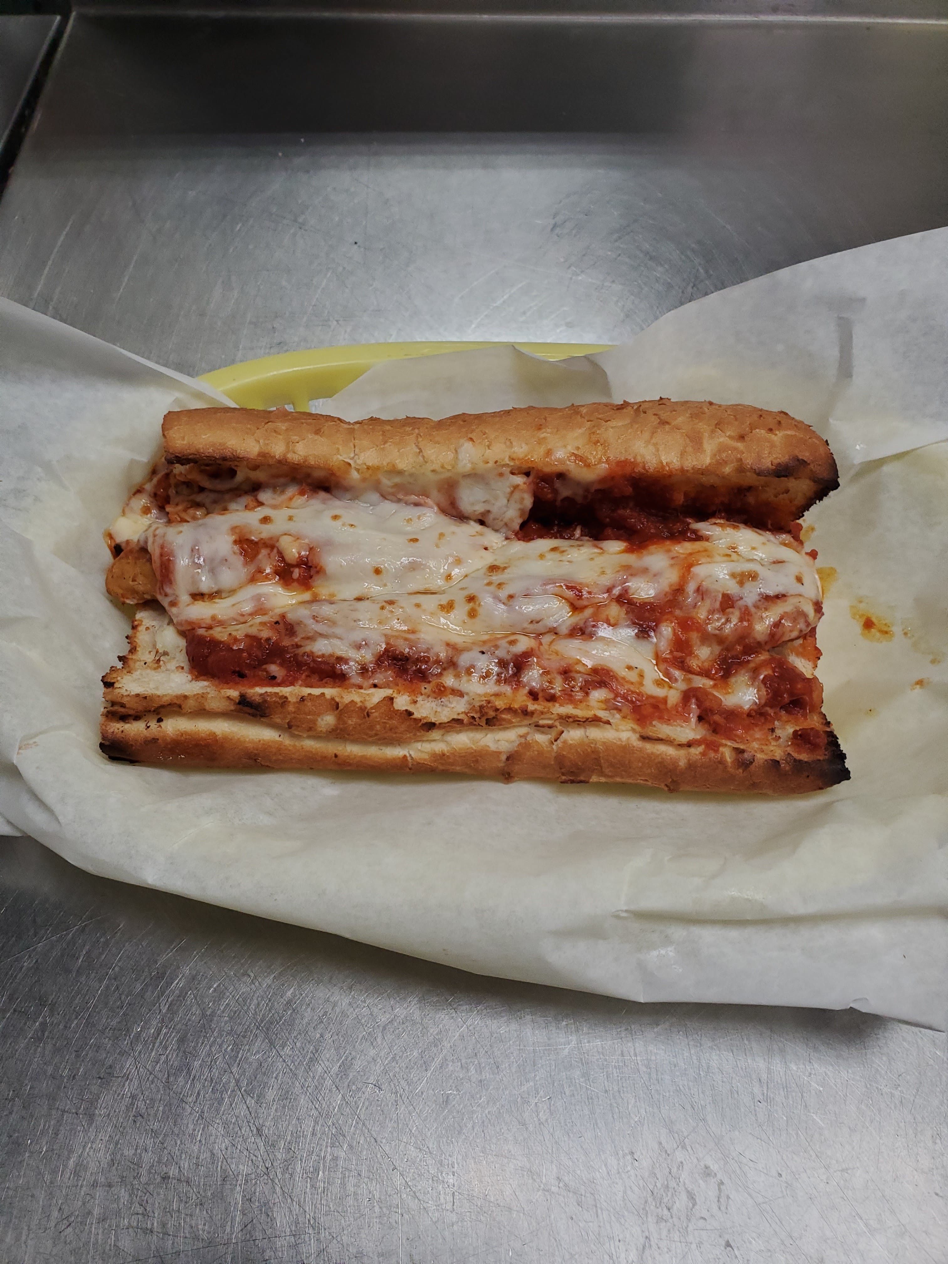 Order Veal Parmigiana Sandwich - Sandwich food online from Pizza Cucina store, Oswego on bringmethat.com