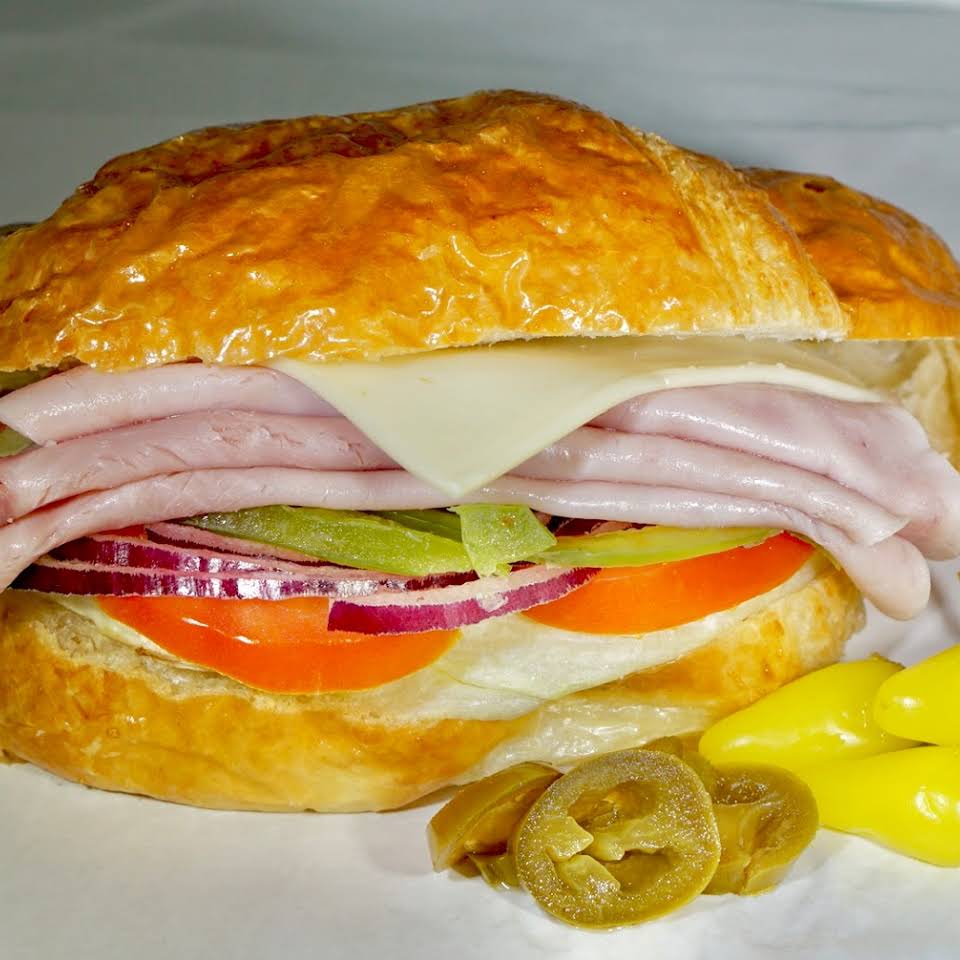 Order 20. Turkey and Cheese French Roll food online from Glady Donuts store, Bellflower on bringmethat.com