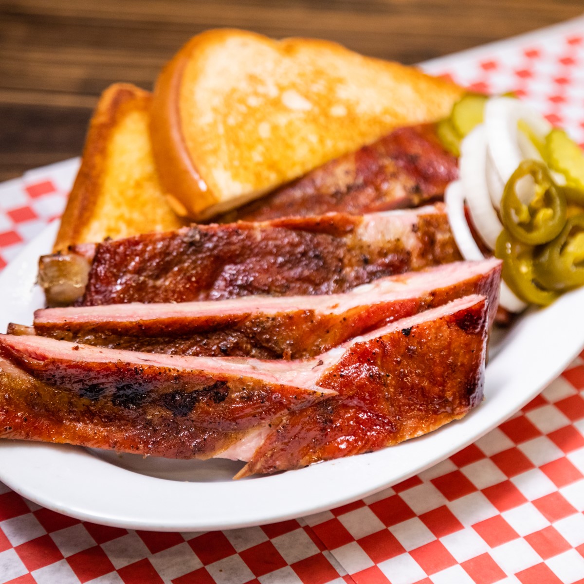 Order 4 Pieces Rib Dinner or food online from Lyndon's Pit Bar-B-Q store, Houston on bringmethat.com
