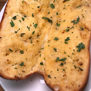 Order Garlic Bread food online from Pizzaiola store, North Babylon on bringmethat.com