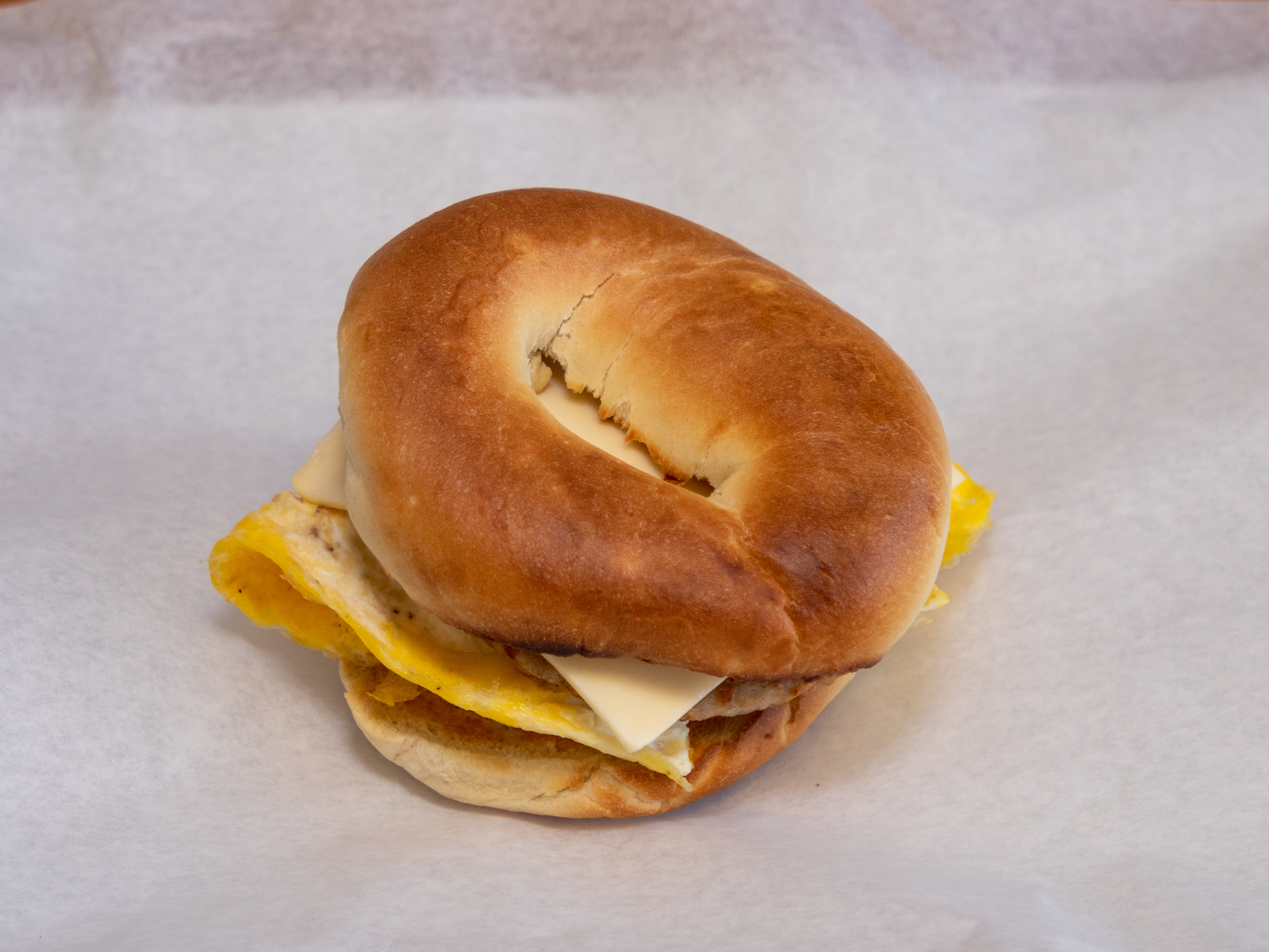 Order Sausage egg and cheese Bagels food online from Donuts Coffee store, Las Vegas on bringmethat.com