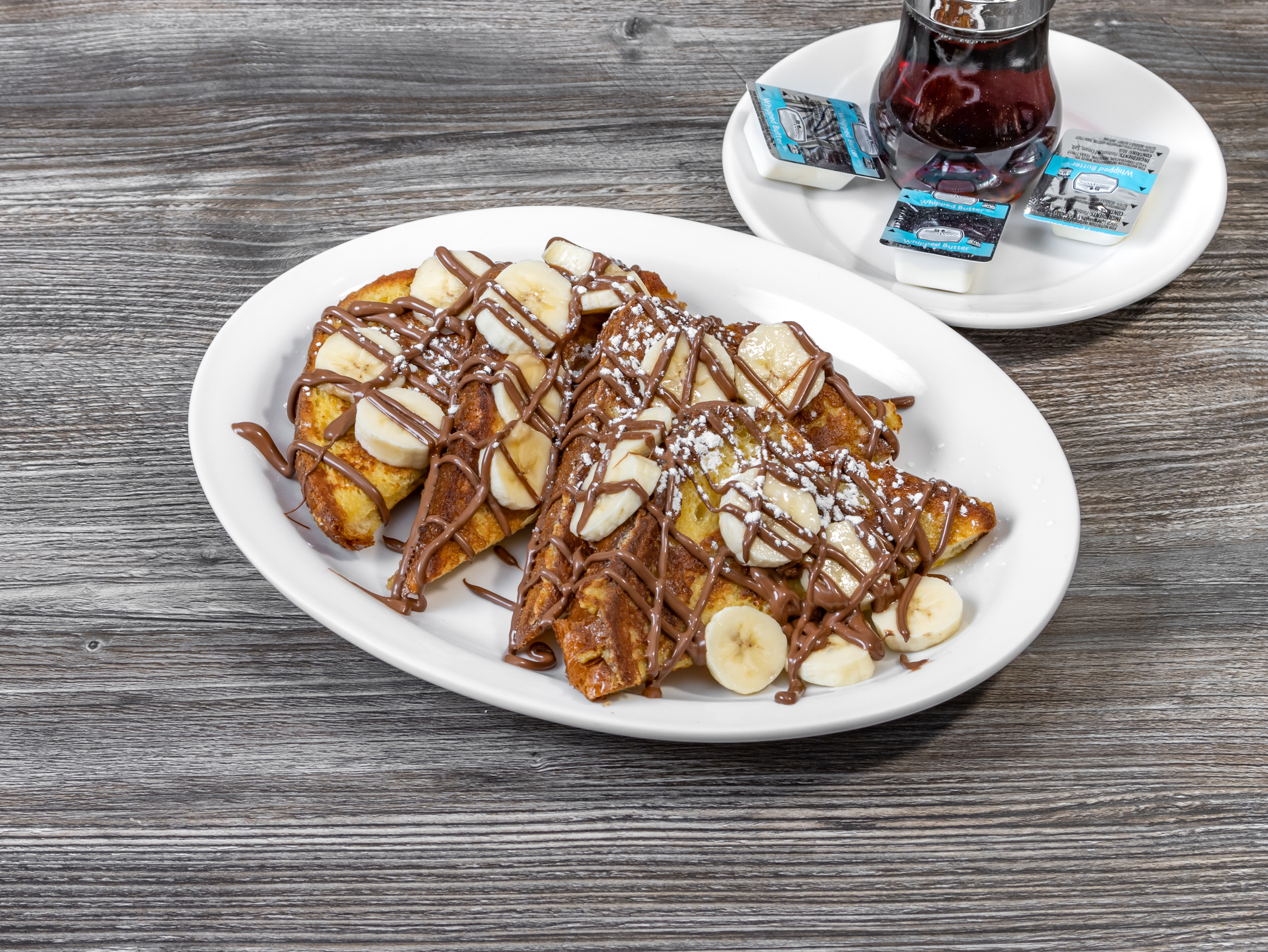 Order Banana Nutella French Toast food online from Eggspress Cafe store, Lewisville on bringmethat.com