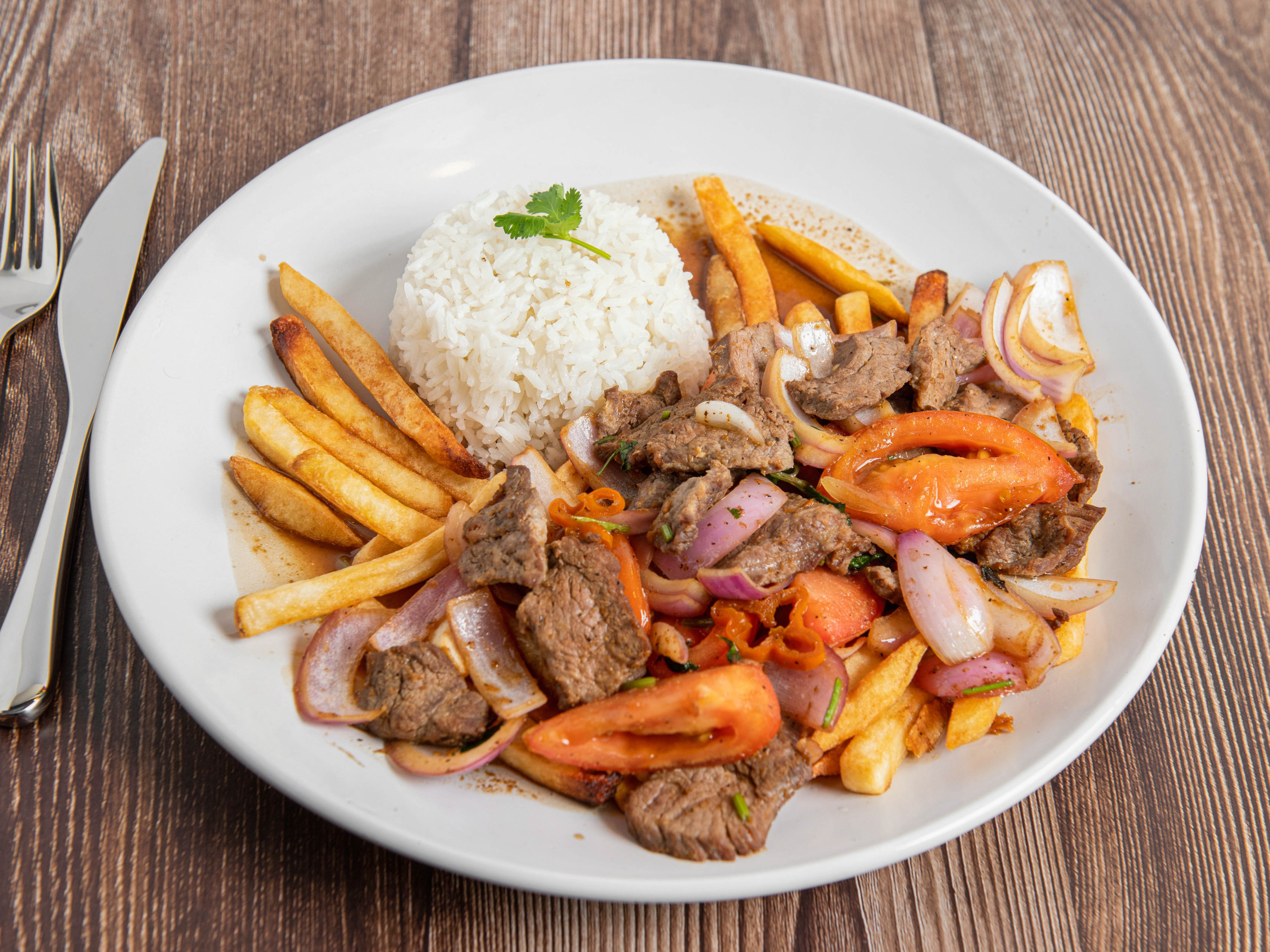 Order Lomo Saltado  food online from Asian Fusion store, Winchester on bringmethat.com