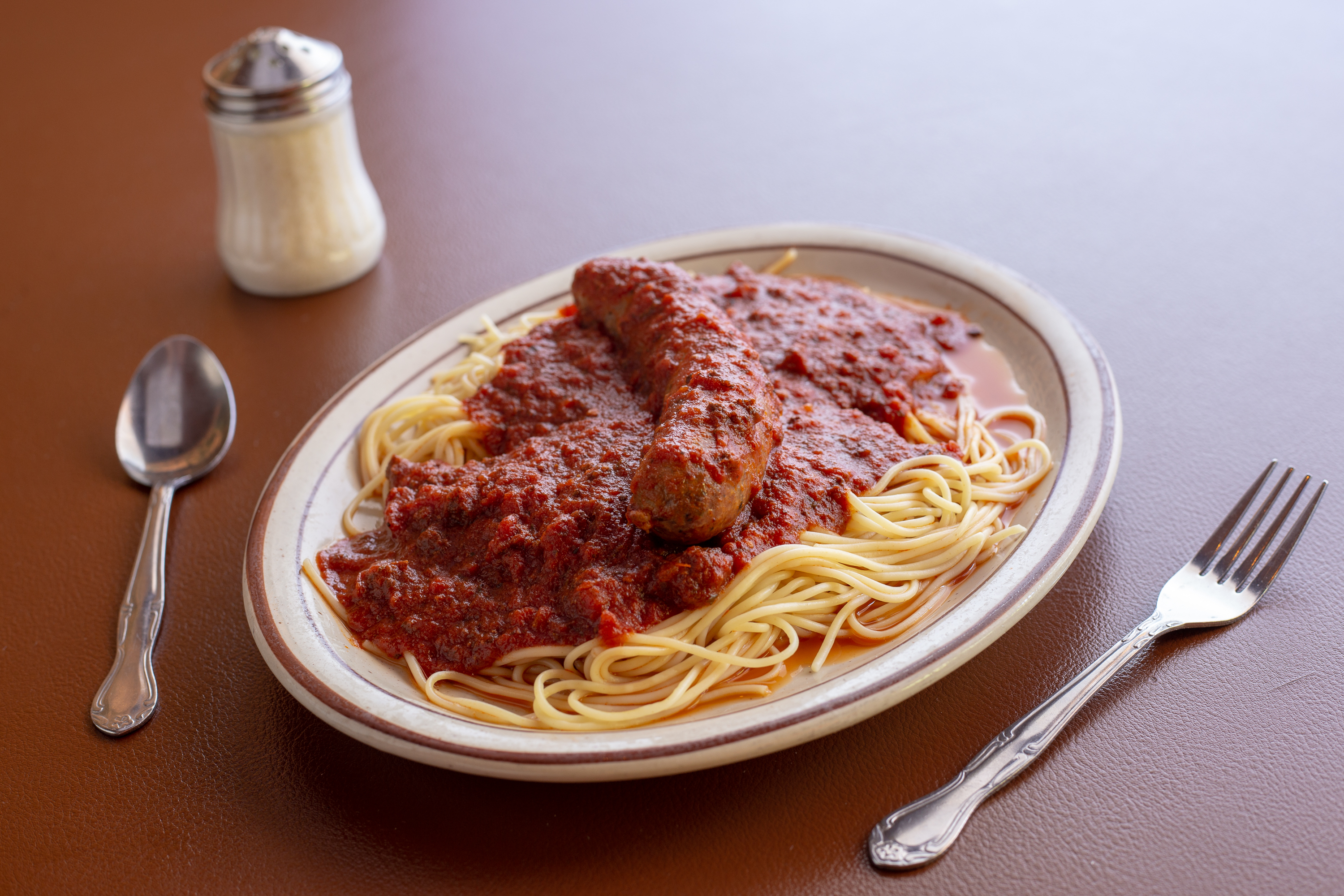 Order Spaghetti with Sausage and Meatball food online from Filippi Pizza Grotto store, San Diego on bringmethat.com