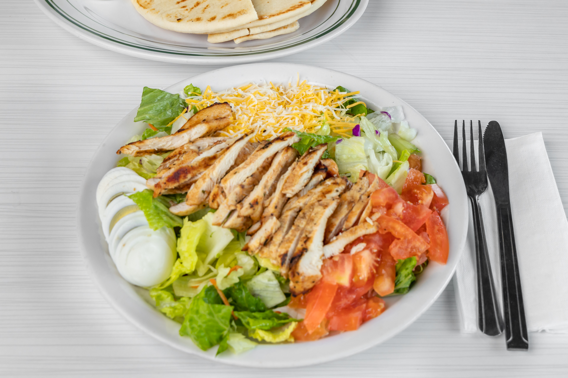 Order Chicken Breast Salad food online from Goody Cafe store, Palm Desert on bringmethat.com