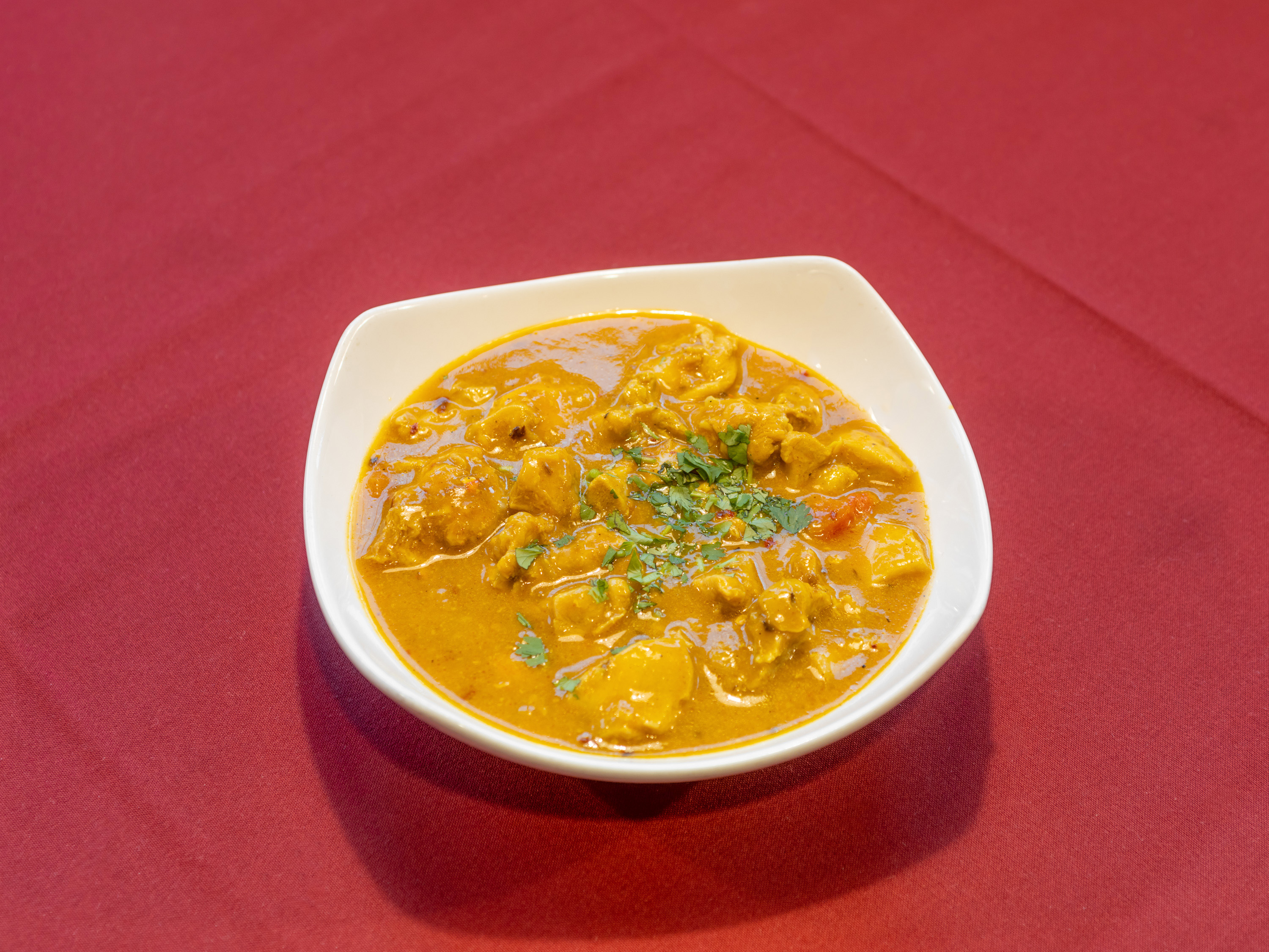 Order Mango Chicken food online from Haveli Indian Restaurant store, Saint Louis on bringmethat.com