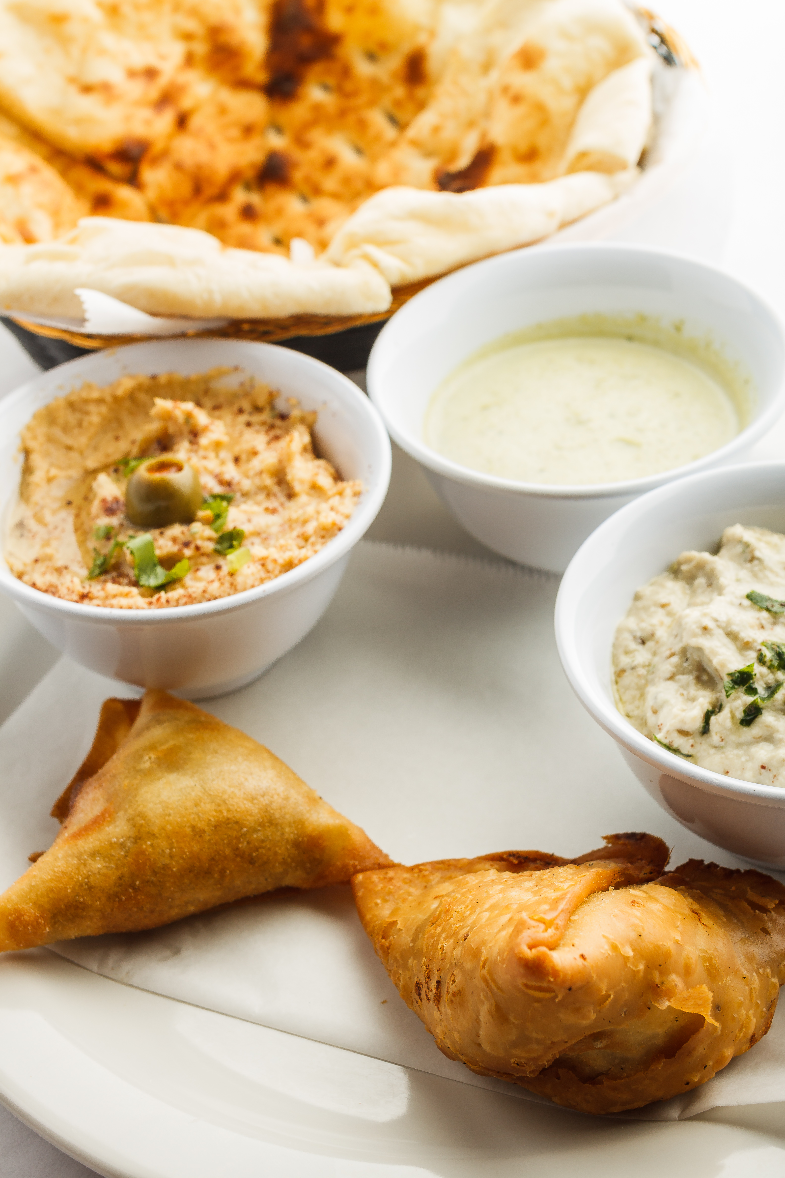 Order Sampler Appetizer food online from Raja Curry Kitchen & Grill store, Lake Charles on bringmethat.com