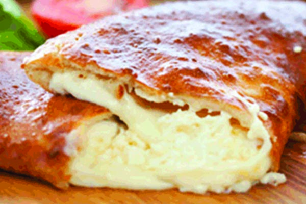 Order Cheese Calzone food online from Umberto Pizzeria store, Bellmore on bringmethat.com