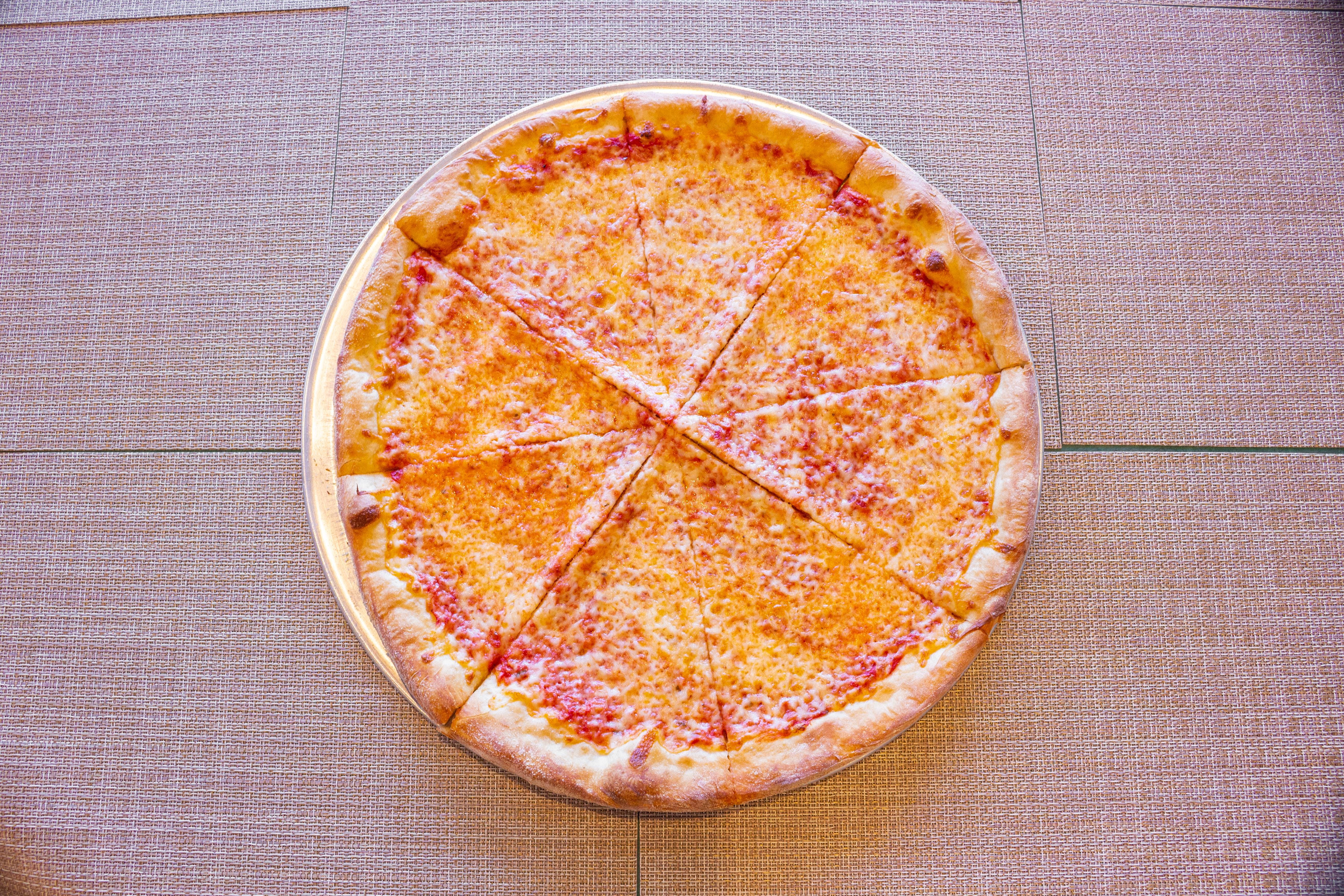 Order Plain Cheese Pizza Slice - Slice food online from Pizza Man Trattoria Italiano store, Pompton Plains on bringmethat.com