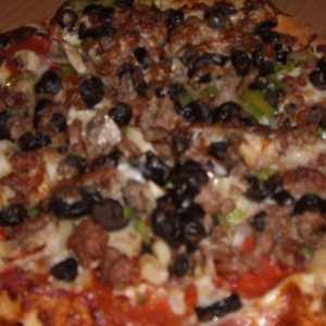 Order Specialty Pizza food online from Uncle Sams store, Peoria on bringmethat.com