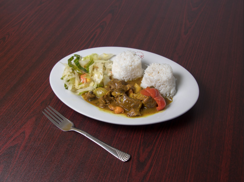 Order Curried Goat food online from C&L Jamaican Restaurant store, Snellville on bringmethat.com