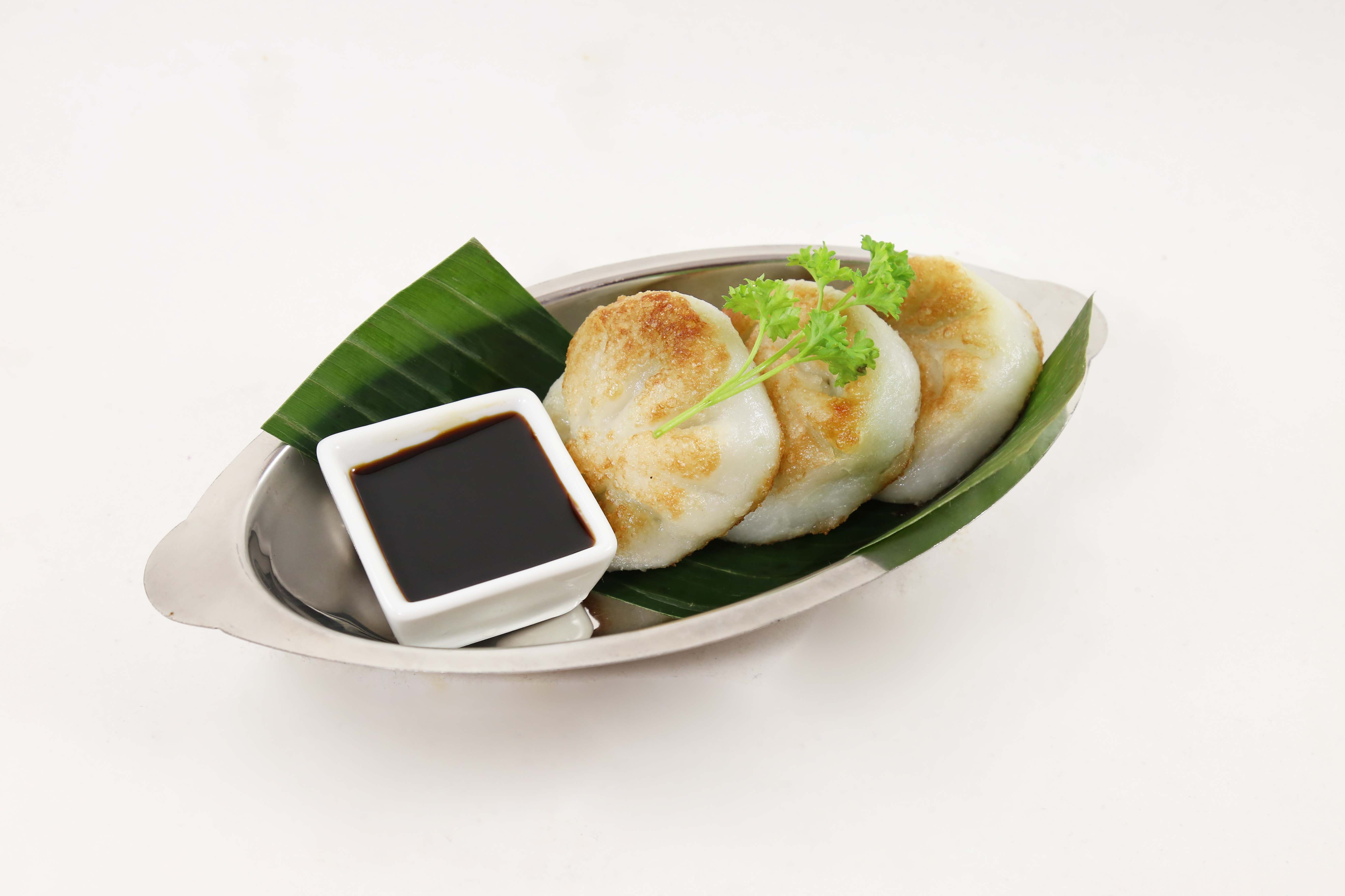 Order 7. Chive Dumplings food online from Eto'O Modern Asian Cuisine store, Chicago on bringmethat.com