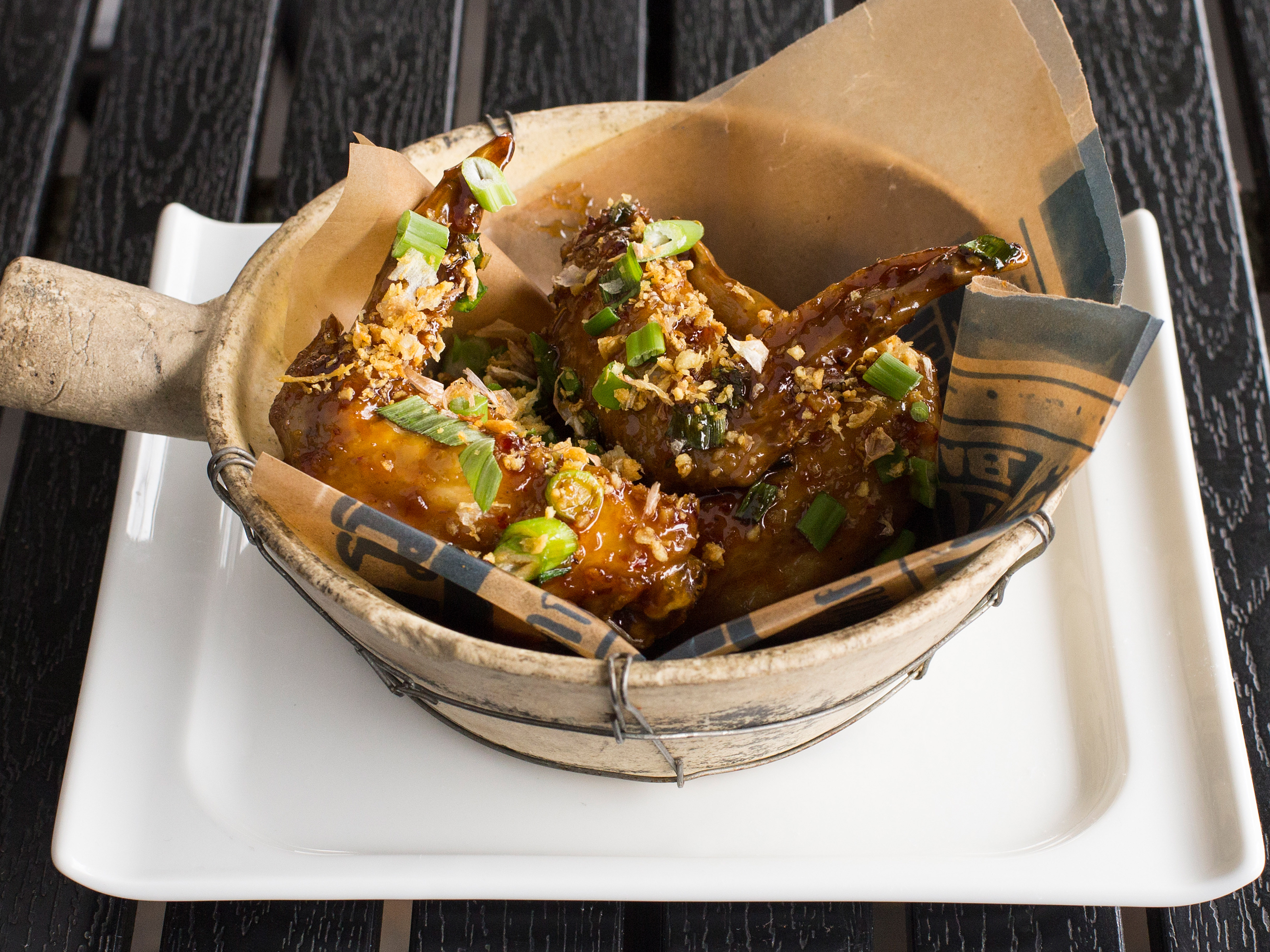 Order Thai Crispy Chicken Wings - peek gai nam daeng food online from PakPao Thai  store, Dallas on bringmethat.com
