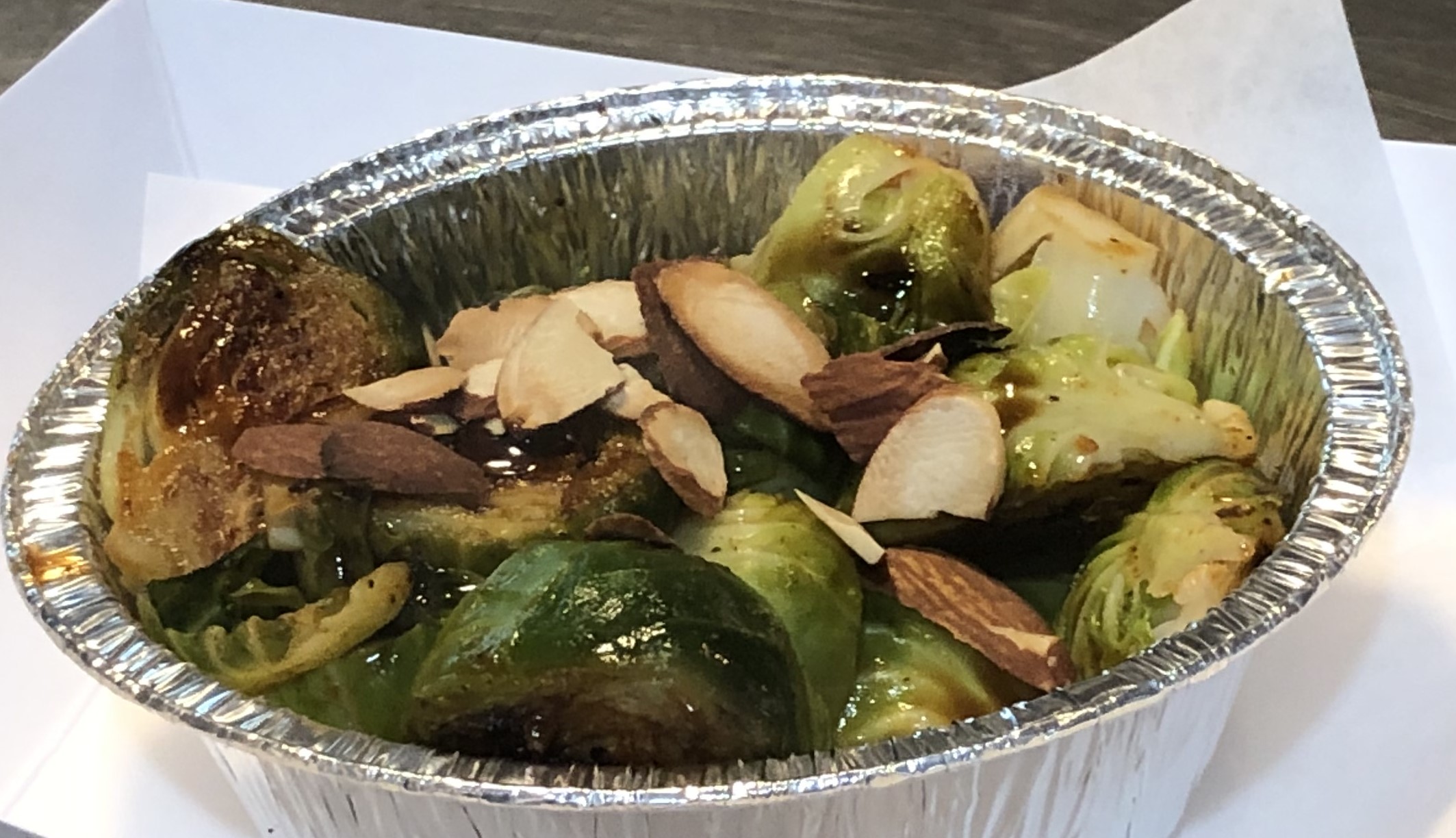 Order Glazed Brussel sprouts with sliced almonds food online from Peachtree Neighborhood Grill store, Nashville on bringmethat.com