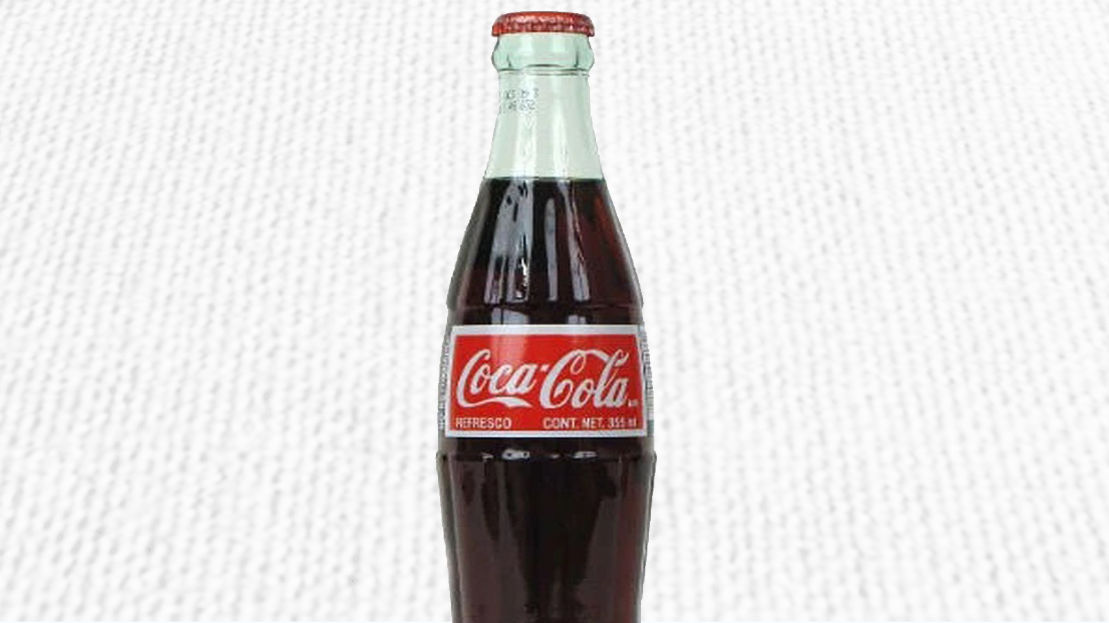Order Coca Cola food online from Famous Apples store, Los Angeles on bringmethat.com