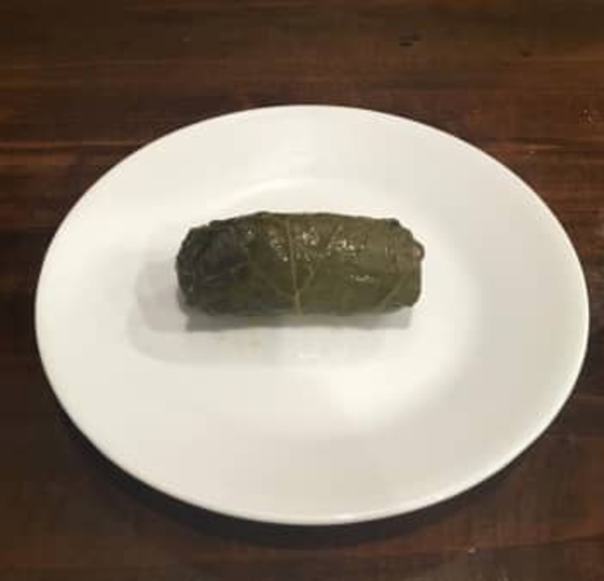 Order Extra Dolmades (1 piece) food online from Little Greek Fresh Grill store, Youngstown on bringmethat.com