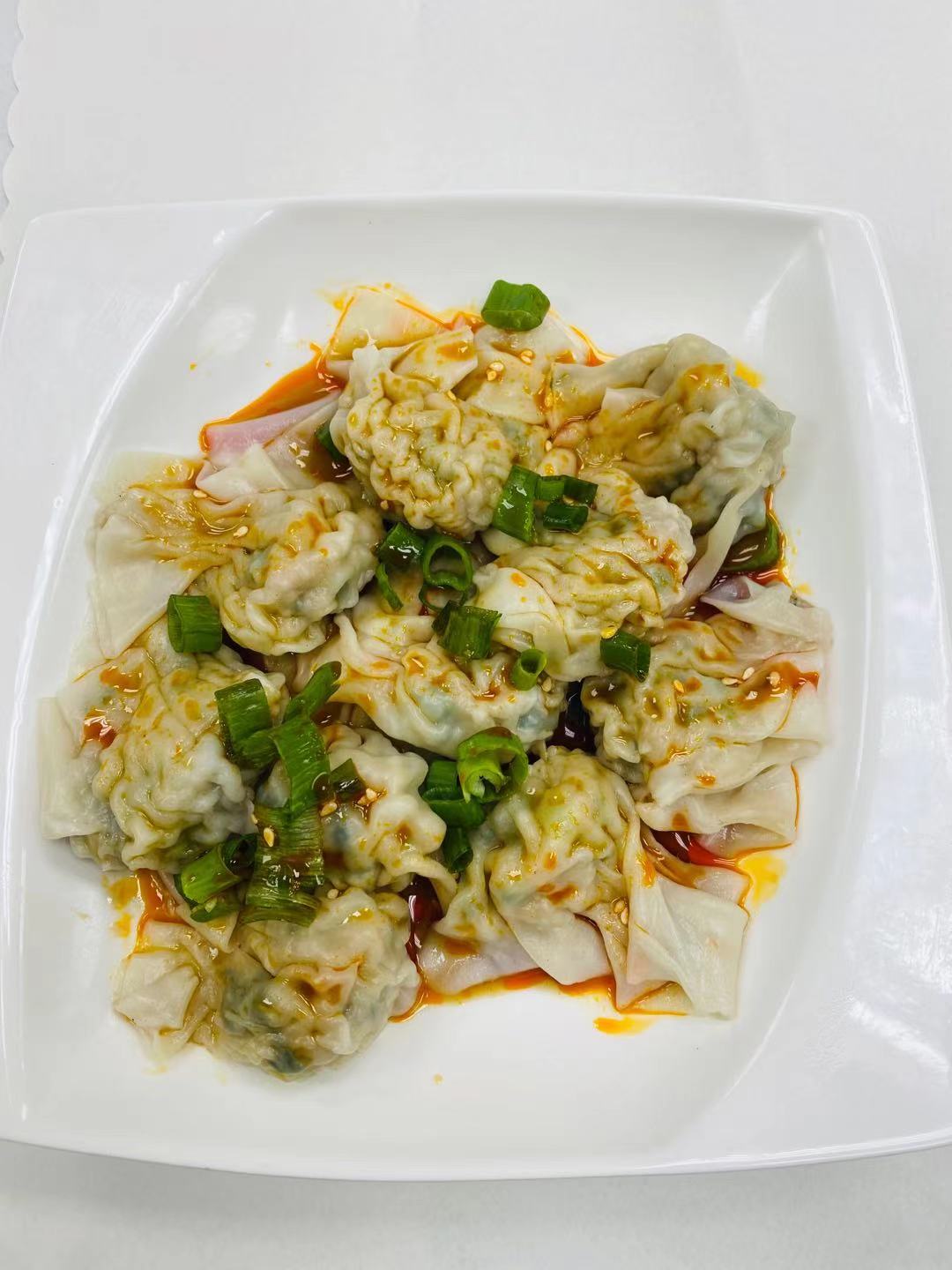 Order Wonton with chill sauce  紅油抄手 food online from Dim Sum Bistro store, San Francisco on bringmethat.com