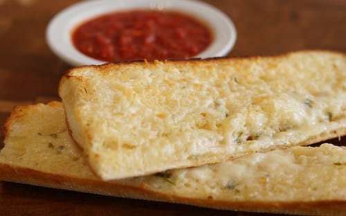 Order Garlic Bread - Appetizer food online from zpizza store, Mission Viejo on bringmethat.com