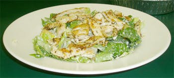 Order Caesar Salad with Grilled Chicken - Salad food online from Primas Pasta & Pizza Restaurant store, Fort Worth on bringmethat.com